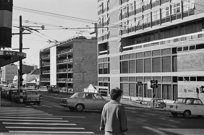 1973: Albert Street, looking north from the Civic Building (Auckland City Council Administration Building) showing the premises of H A Tuck, R G Duffy (Peglers Building), Stirling House and the Public Trust Office. Wellesley Street West can be seen running left to right near the top of the image (Photo: Sir George Grey Special Collections, Auckland Libraries, 786-A019-1)