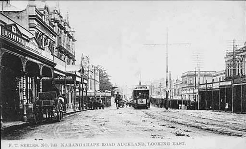  TRAMS ARRIVE: This is how the street looked in 1906 - looking east along Karangahape Road, towards Pitt Street. Showing the premises of Mrs R Campbell, ladies outfitter, W F Jamieson, hairdresser, Foresters Hall, Naval and Family Hotel, Tatterfield