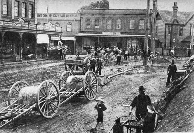   TRAMS ARRIVE: Laying tram lines near the corner of Mount Eden Road and New North Road, Eden Terrace in 1908 (Photo: Sir George Grey Special Collections, Auckland Libraries, 7-A4972)  