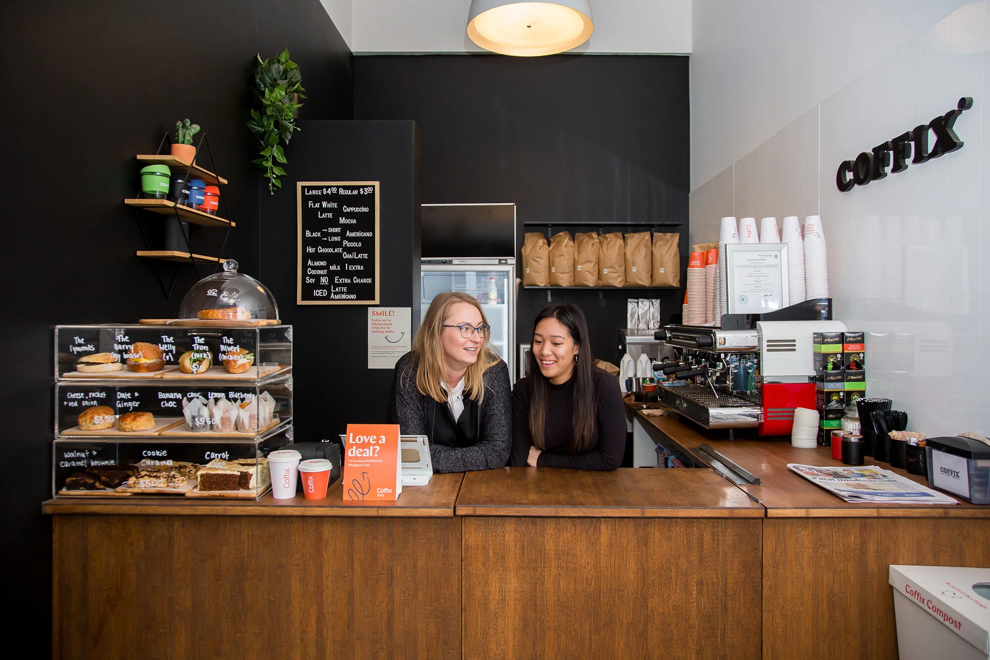 Kate (left) knows most of her regulars’ coffee orders by heart.