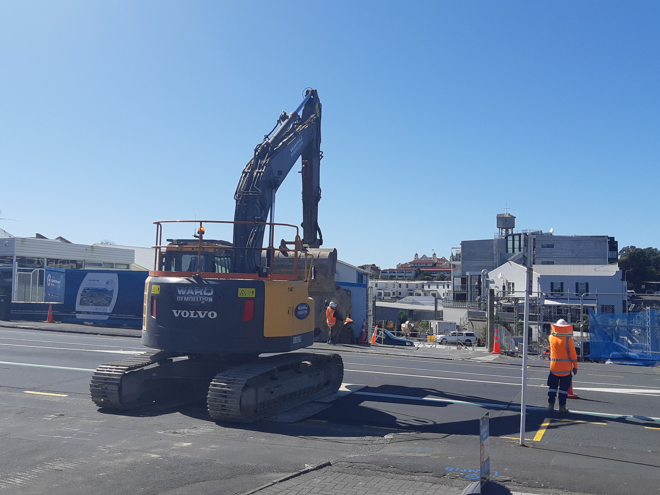 Digger crossing Mt Eden station March 2020
