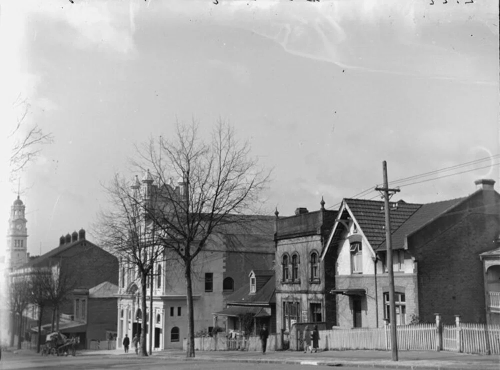Historic photo from the area, Looking north along Greys Avenue showing the Salvation Army Congress Hall (centre left), Auckland Town Hall (extreme left).