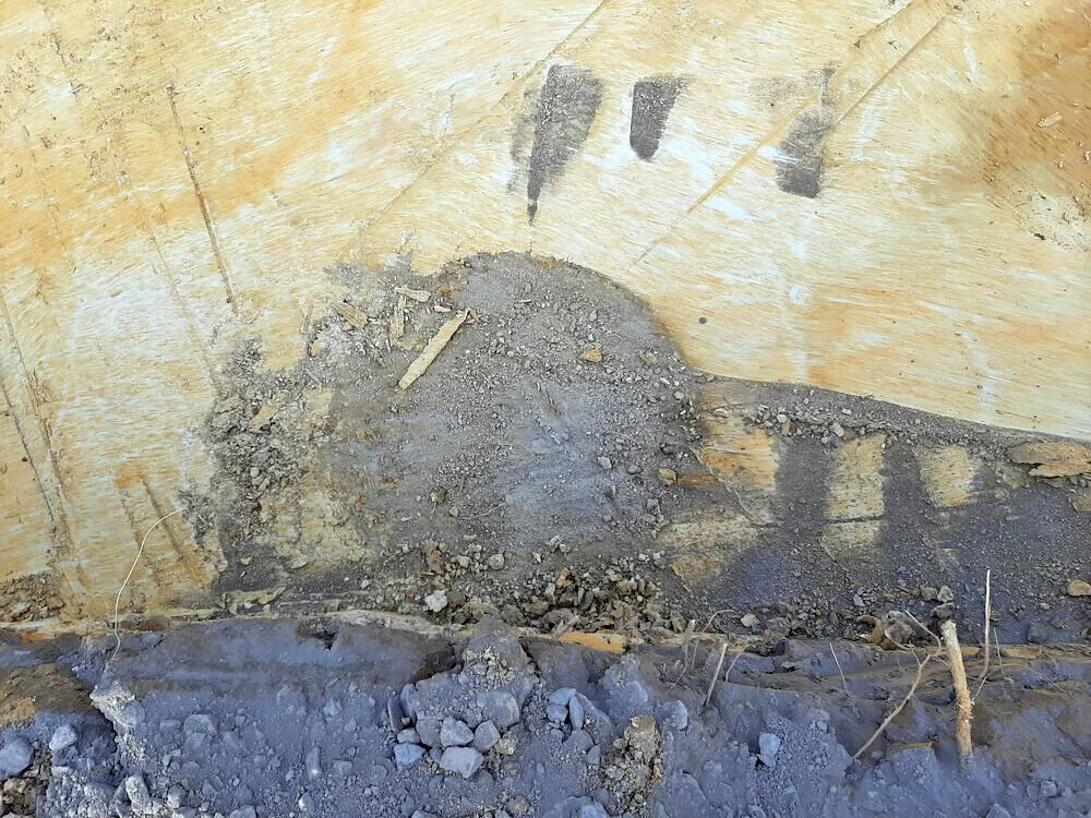 The old well cut into virgin clay 