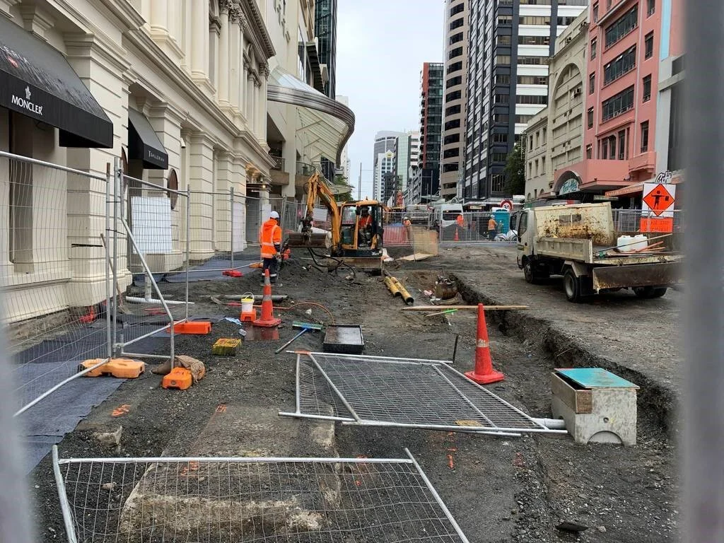  Removal of the old footpath &amp; services relocation outside the Vault in Lower Albert St 