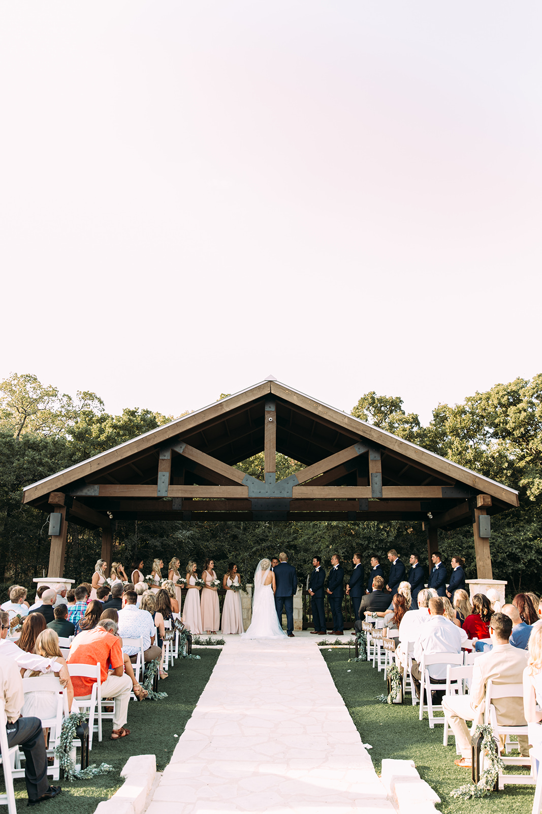 rustic outdoor summer wedding ceremony