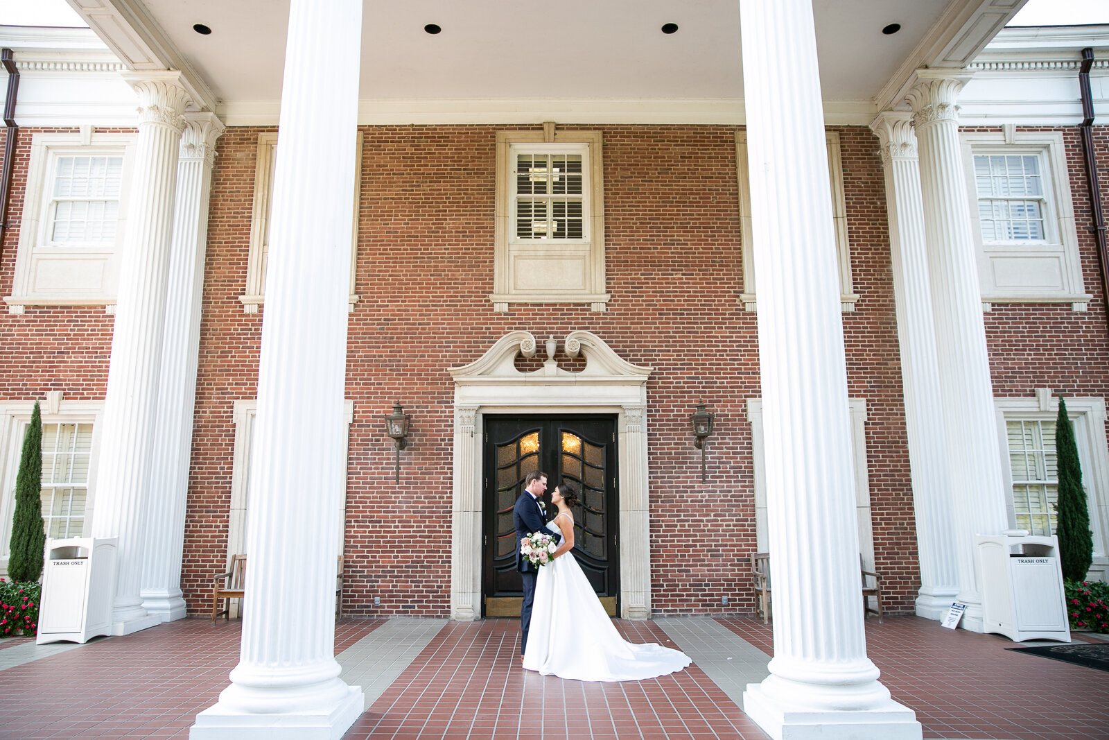 bride and groom country club wedding portraits