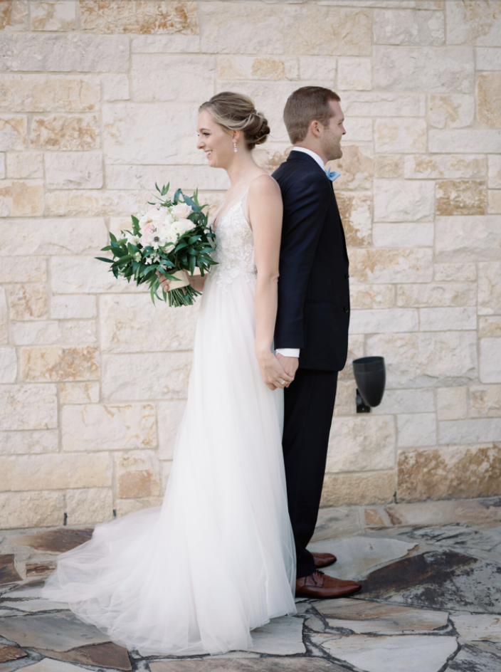 bride and groom first touch