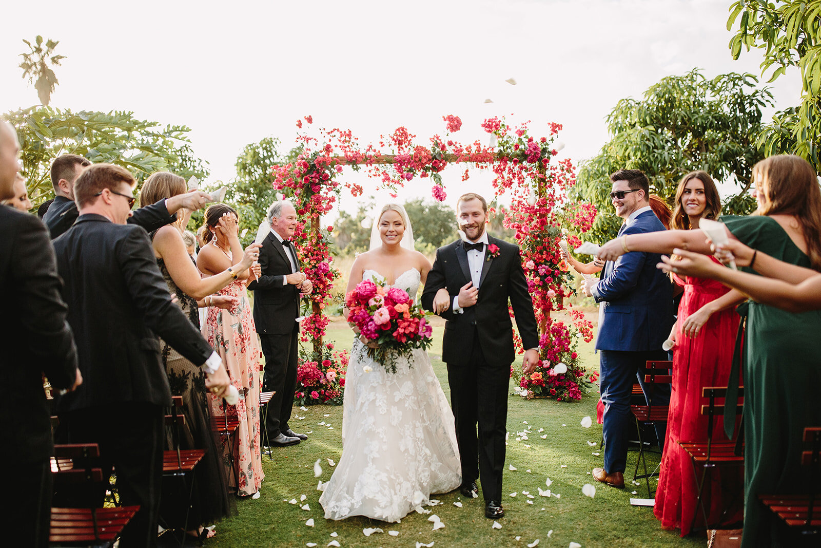 bride and groom wedding ceremony petal toss