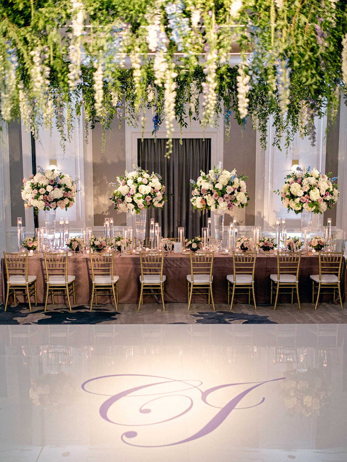 colorful spring wedding reception hanging floral halo