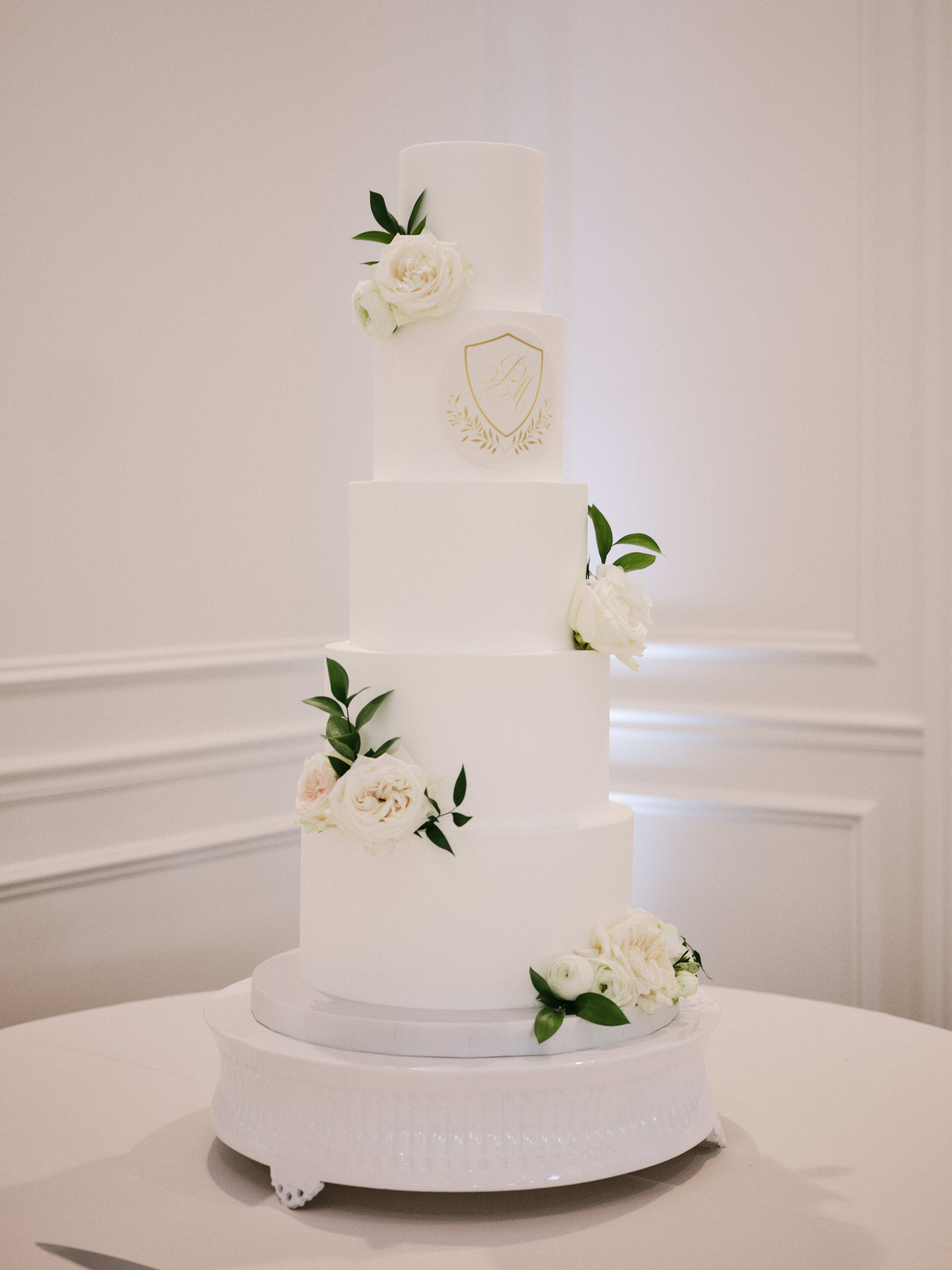 classic white monogram wedding cake design