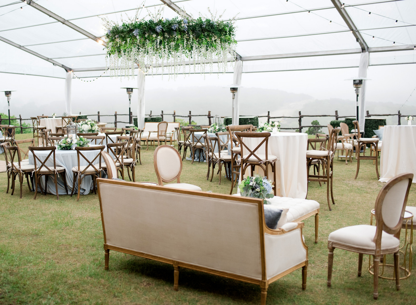 tented outdoor wedding reception flowers