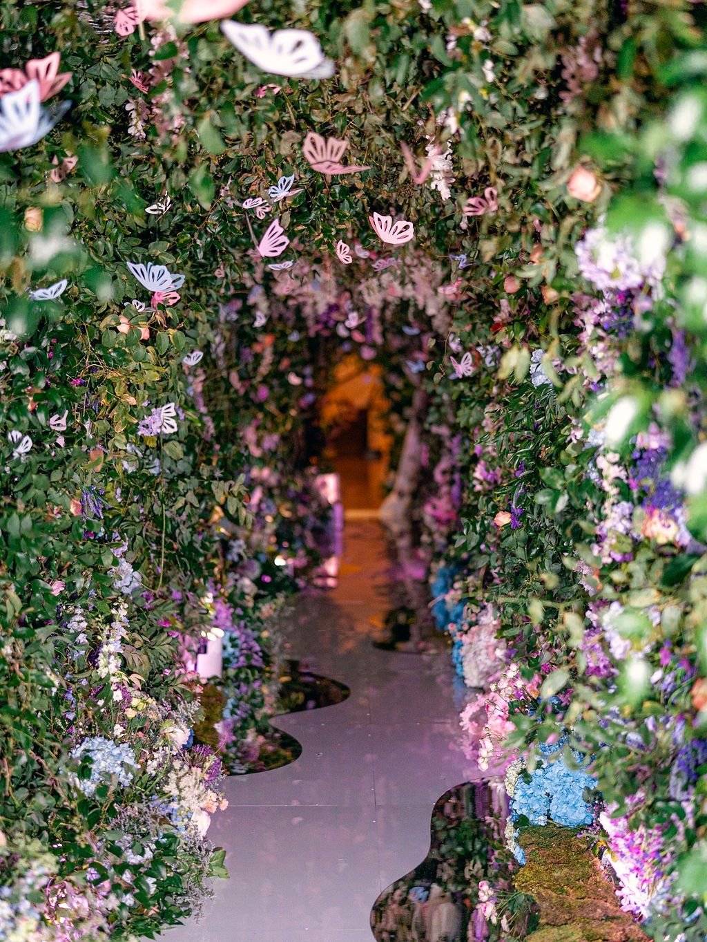 wedding floral tunnel reception entrance