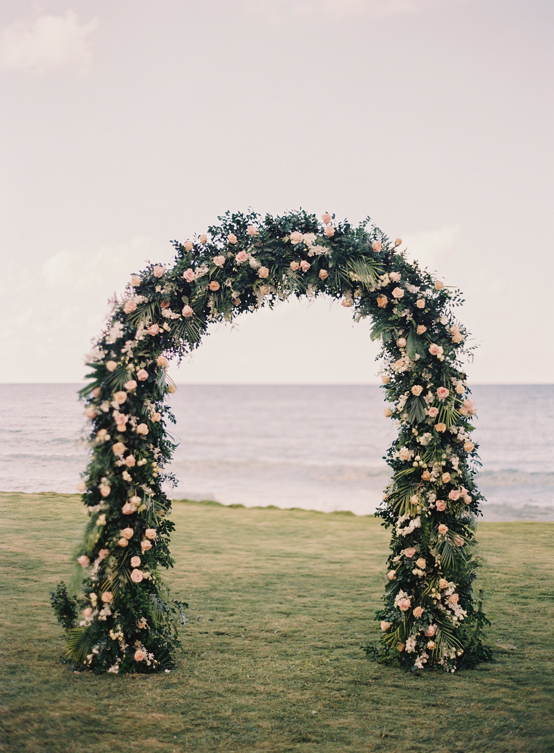 tropical wedding ceremony flower arch