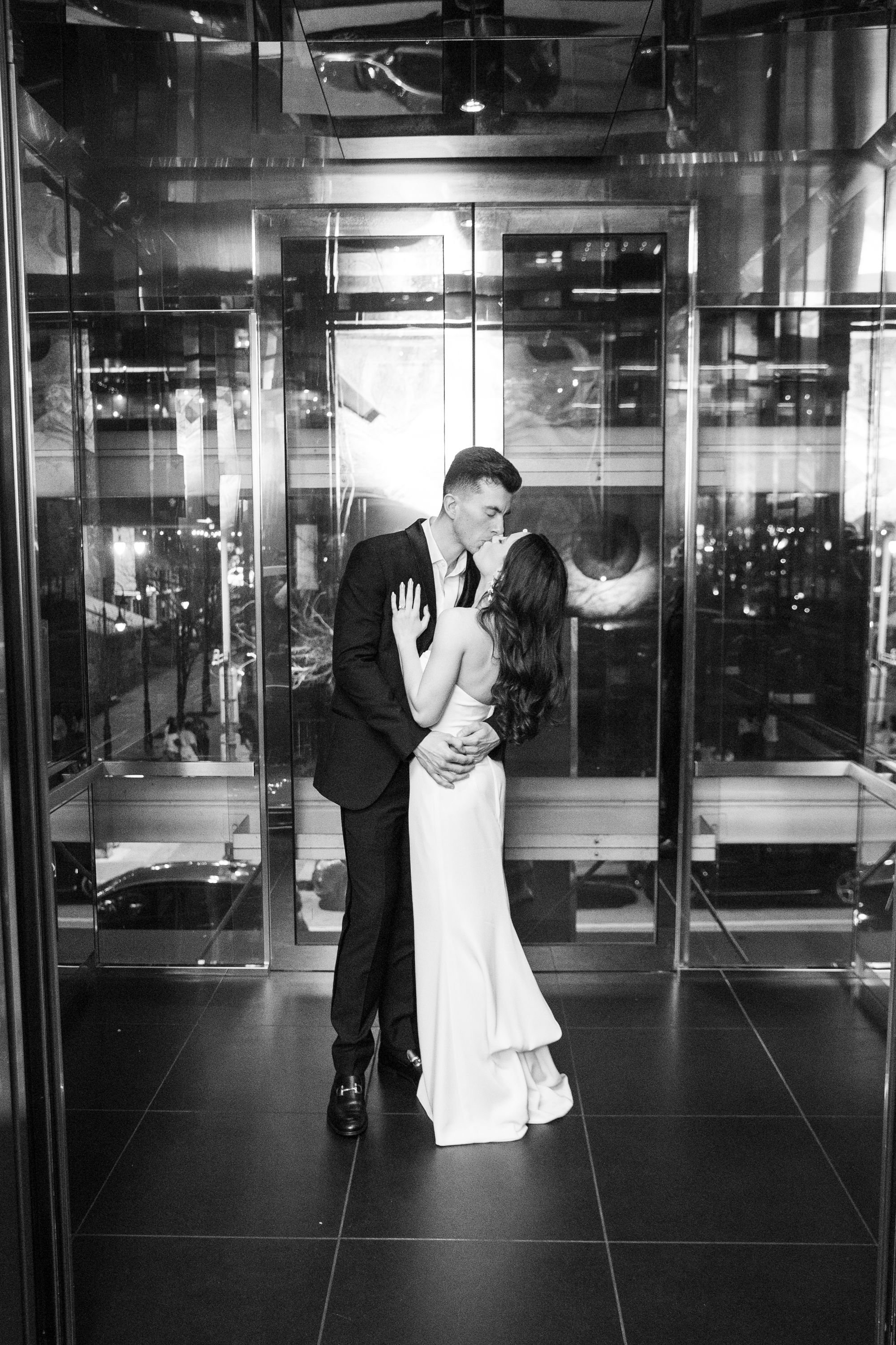 bride and groom elevator wedding exit