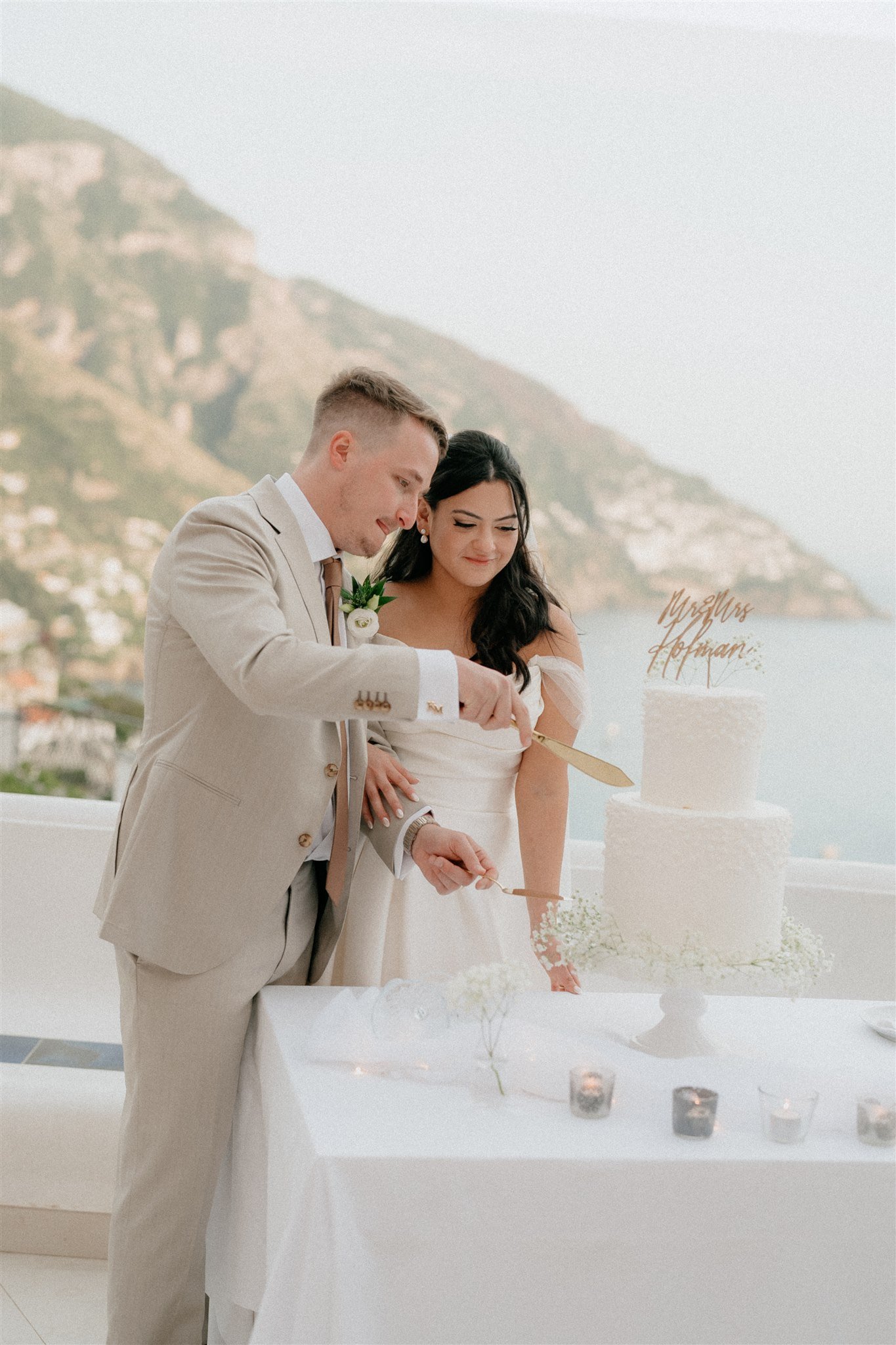 bride and groom positano wedding italy wedding cake