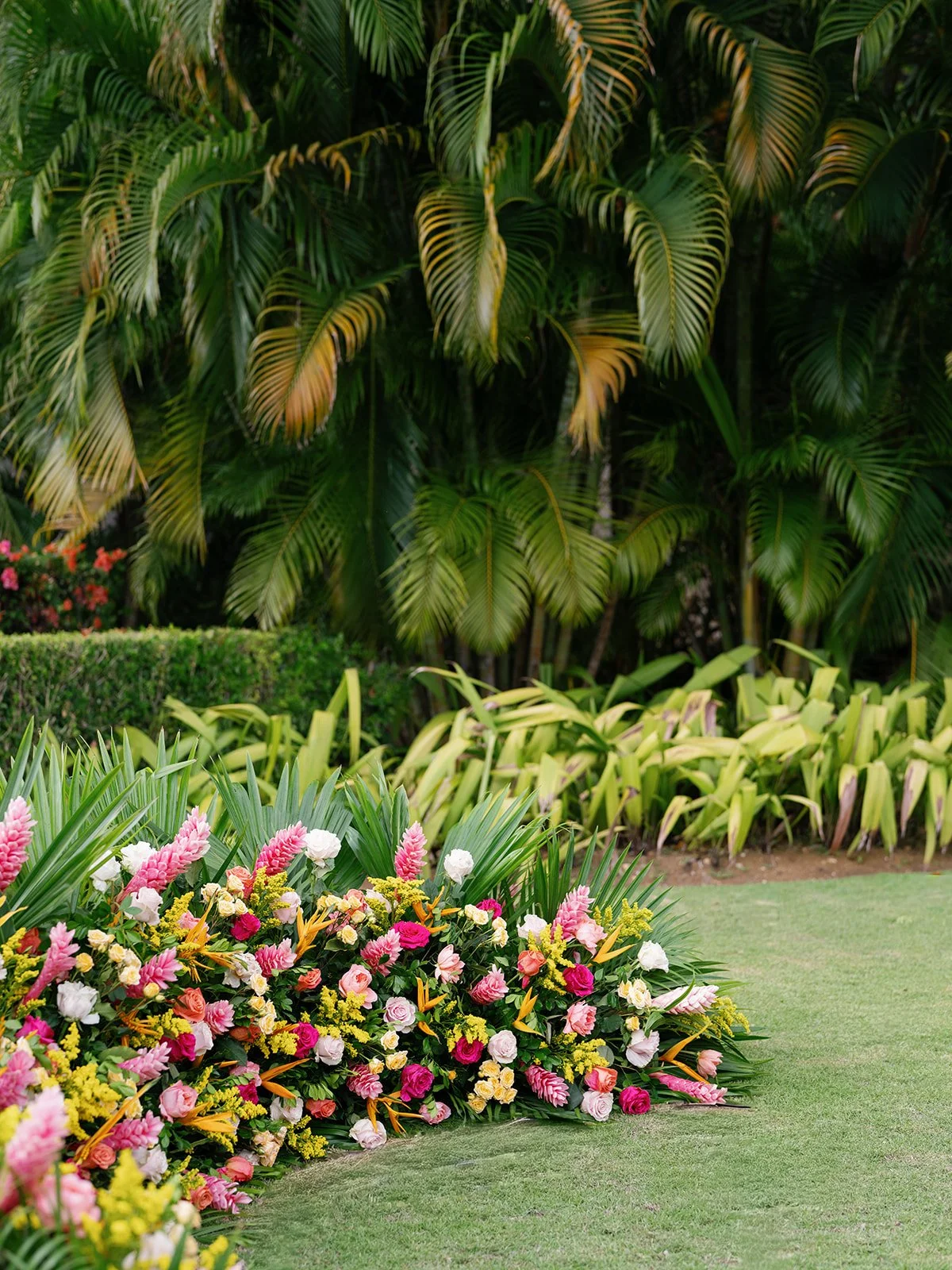 tropical wedding ceremony altar floral
