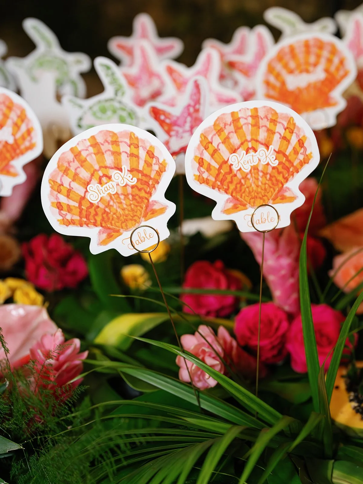 round hill resort tropical wedding escort cards