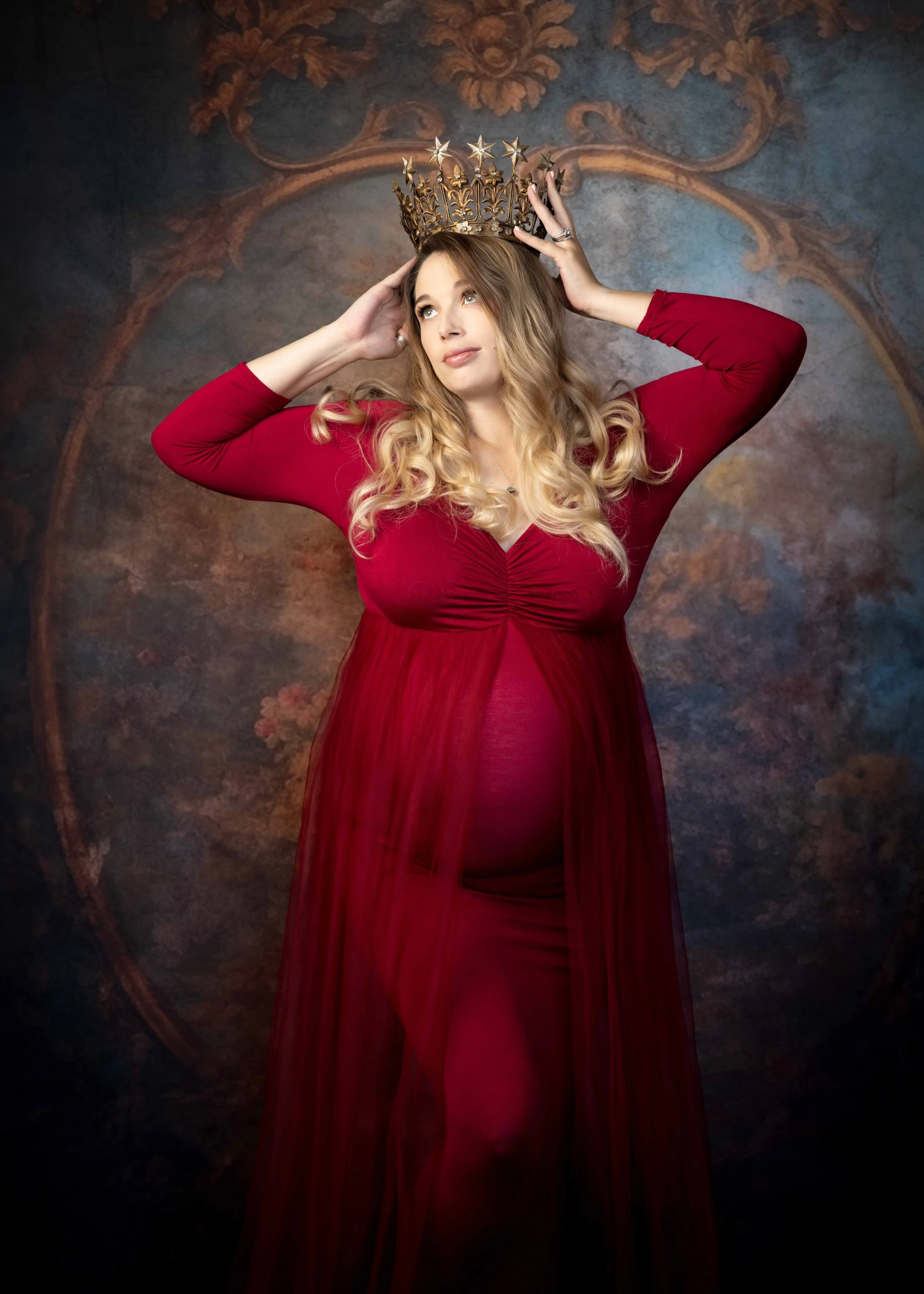 Mom to be with crown in red gown.JPG