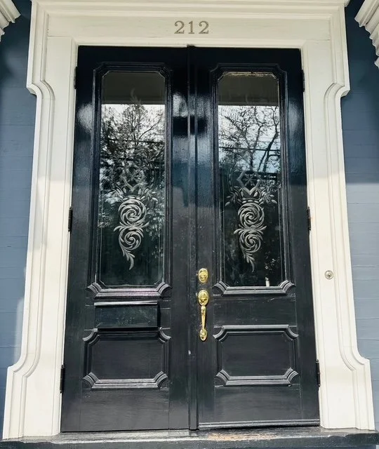 After - Glass in place, doors restored.