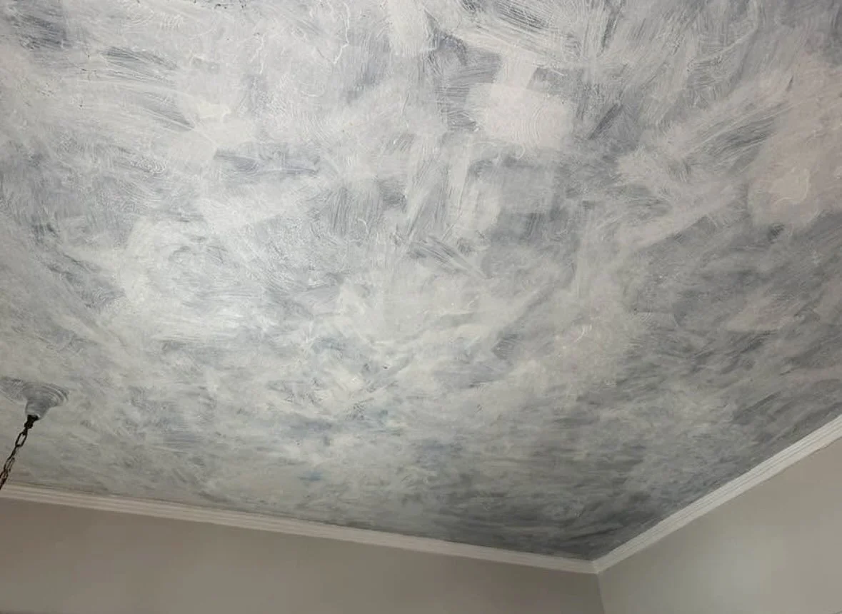 Decorative finish on ceiling.