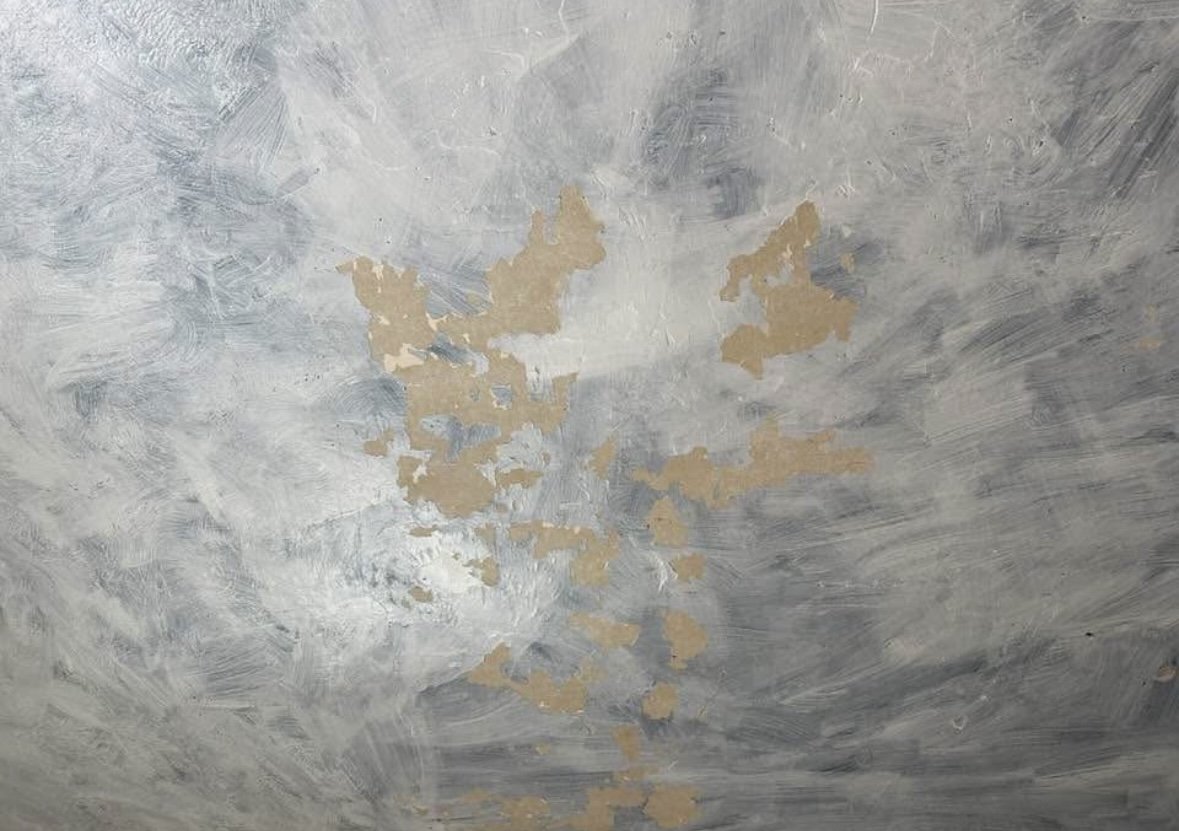 The decorative paint finish on this ceiling had water damage. Bill matched the paint colors and repaired the finish.