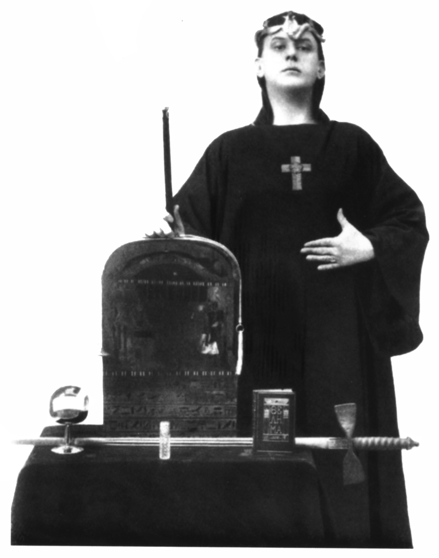 The Magician Aleister Crowley posing with the tools of his art