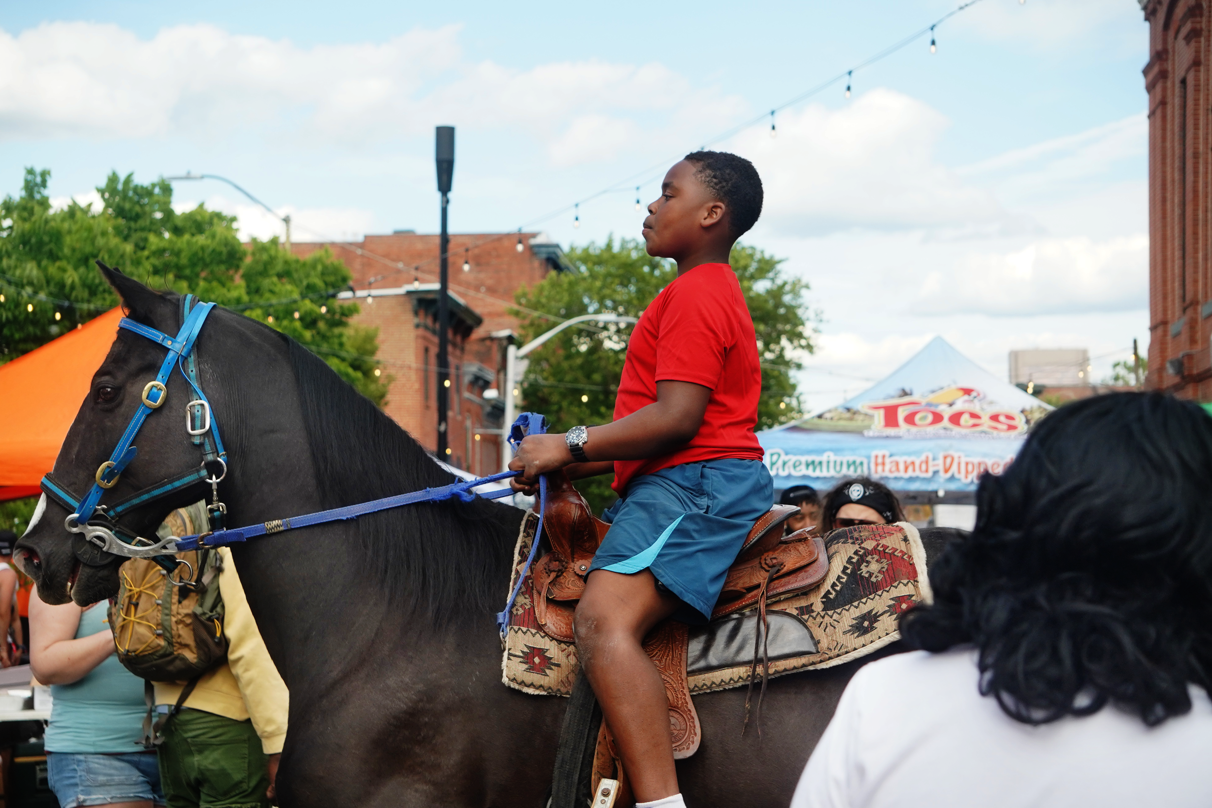 Boy Riding Horse at Sowebo.png