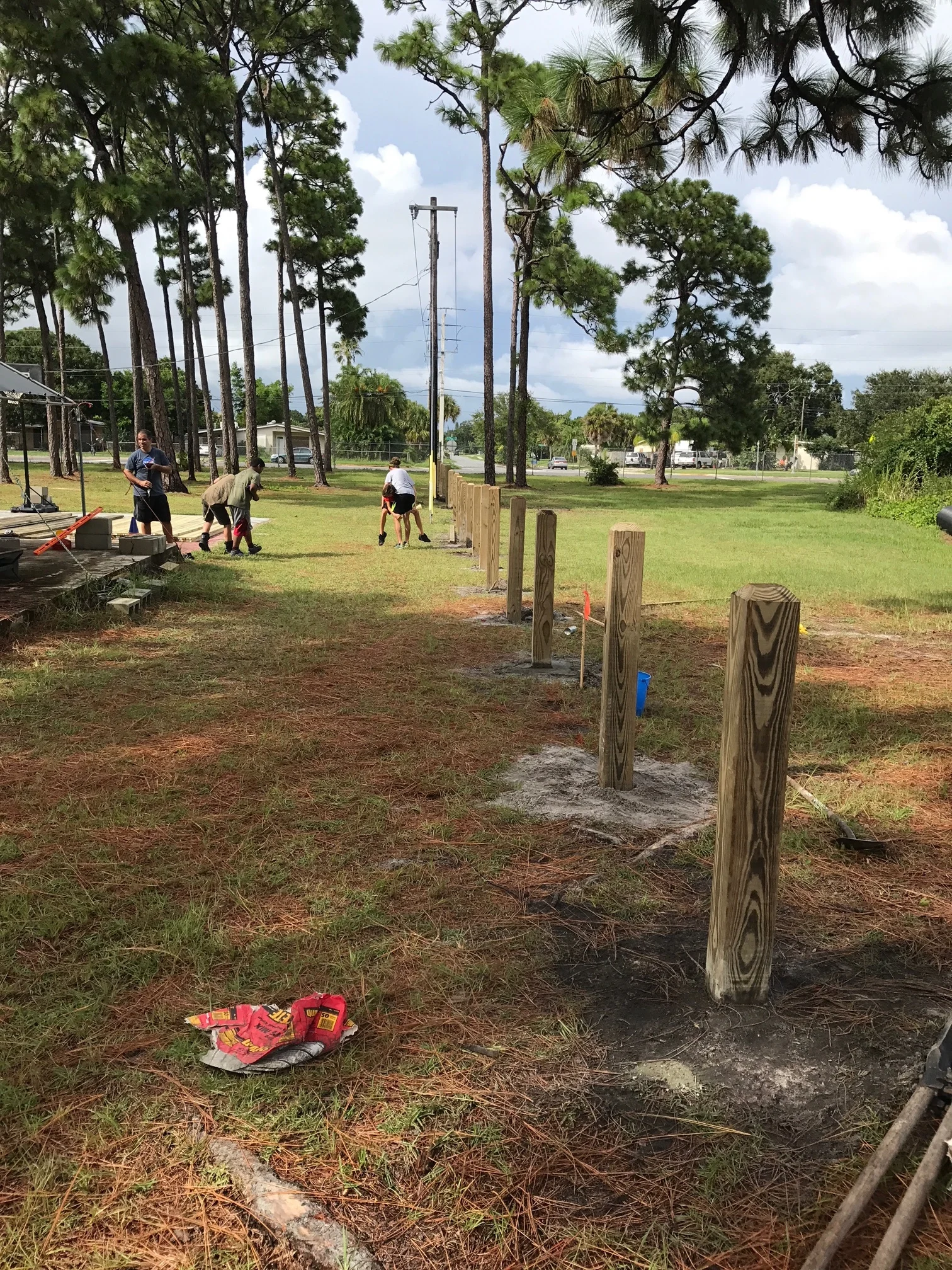Posts were cemented in for stability (it already made it through Irma). The fence-line was canted up and down to match the hills and valleys as it moved along.