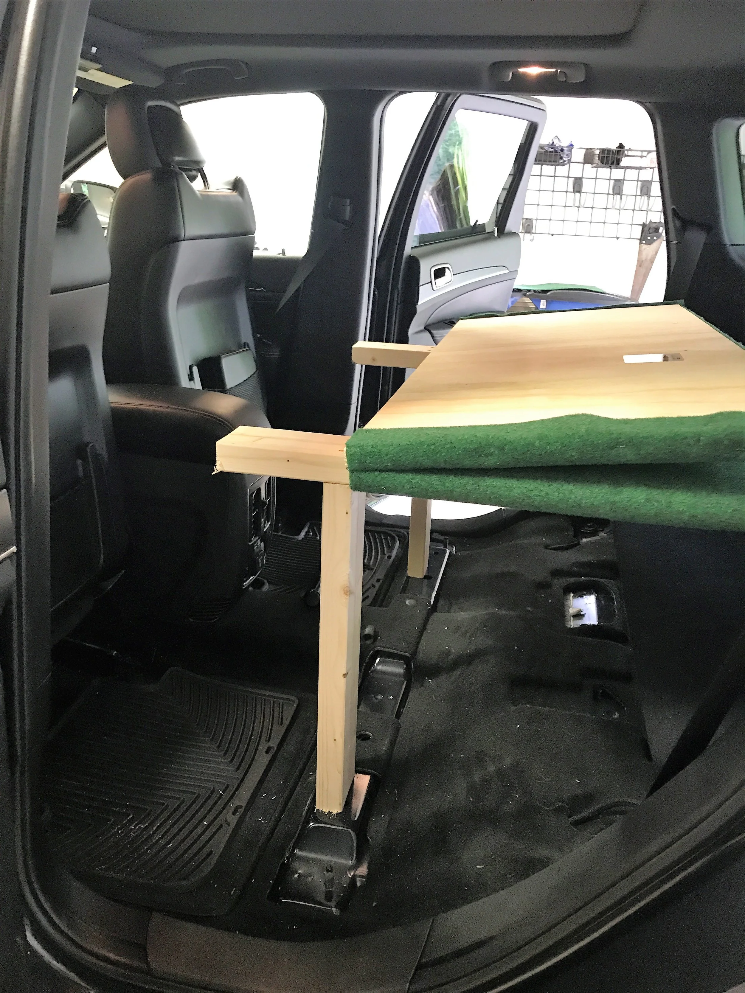 Final product with the bed folded up, thanks to our hinge