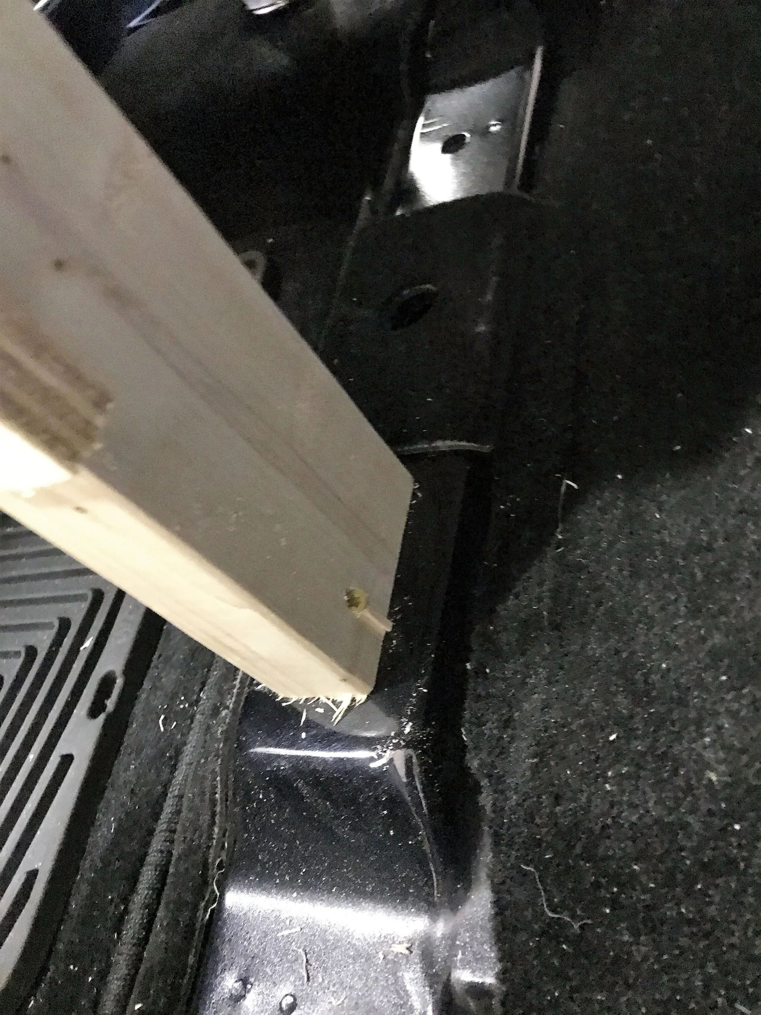 Secured the legs to the car, using the existing holes that held the rear seats