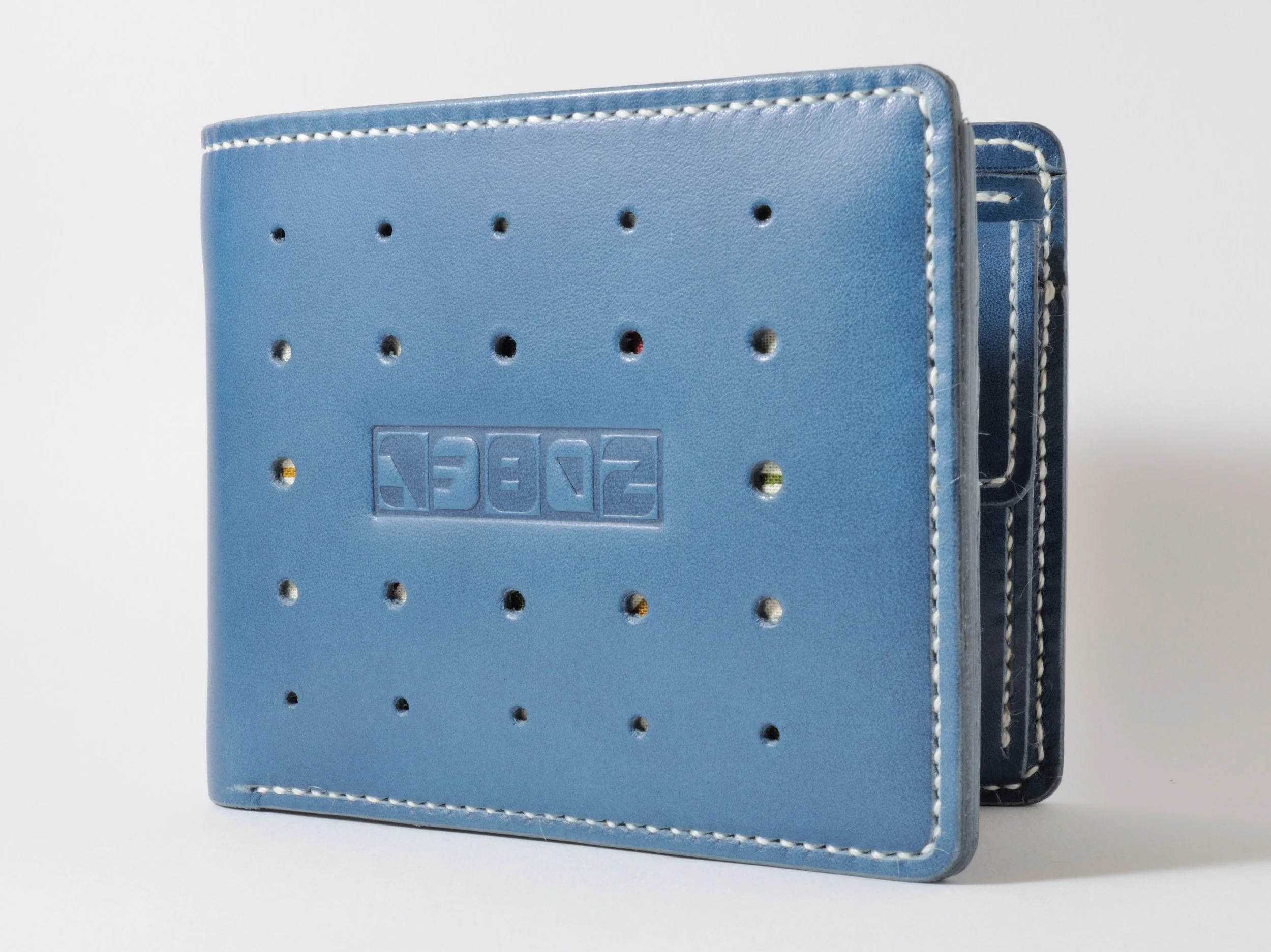 Blue w/ square hole punch pattern & multi-colored Japanese fabric liner*