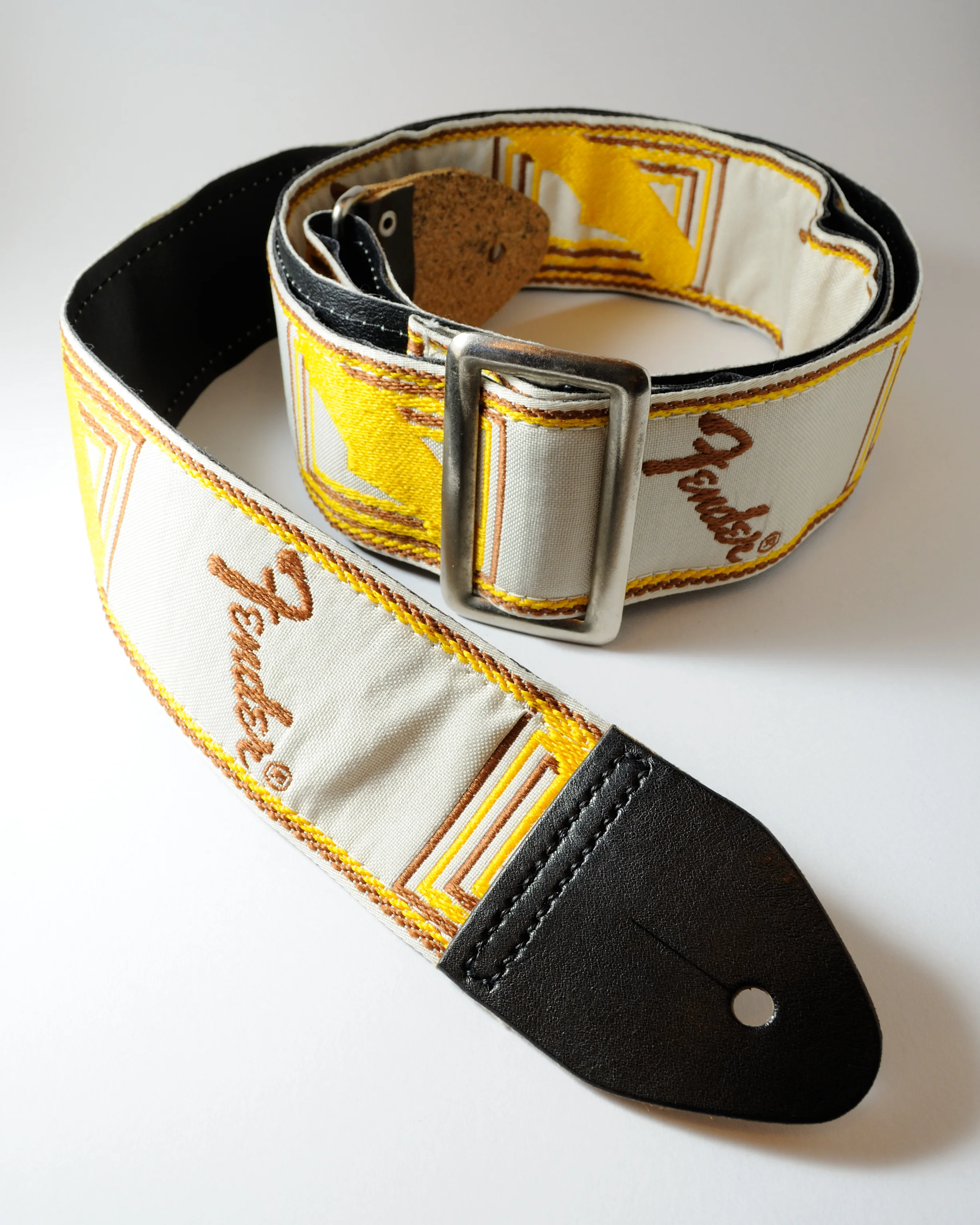 Light Grey, Brown & Yellow FENDER Strap w/ Black Leather Ends
