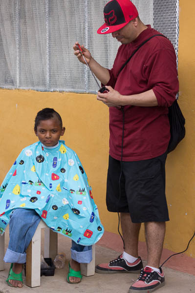 new clothes, shoes and haircuts for children from the dump landfill