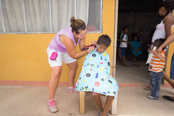 new clothes, shoes and haircuts for children from the dump landfill