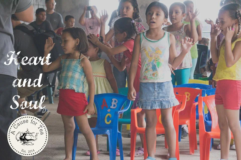 Children worshipping in Cristo Rey and A Cause for tea