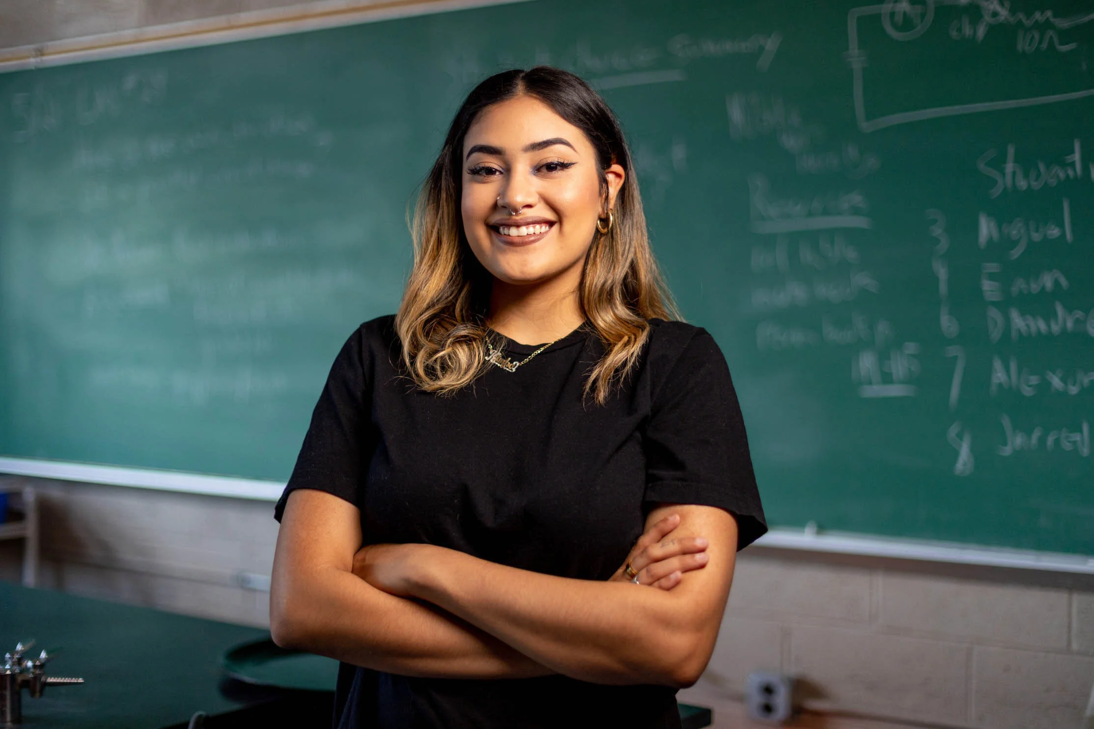 A portrait of a student in a school classroom for an education advertising campaign.