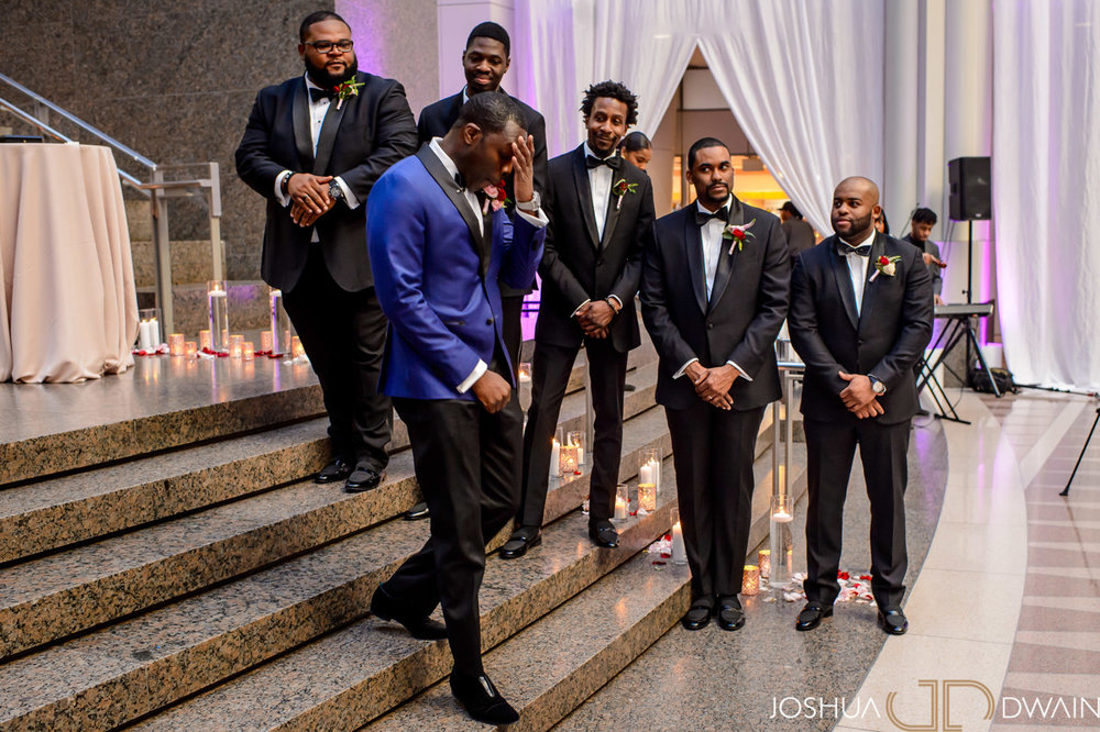  Tolu wipes a tear as he goes to get his bride.  