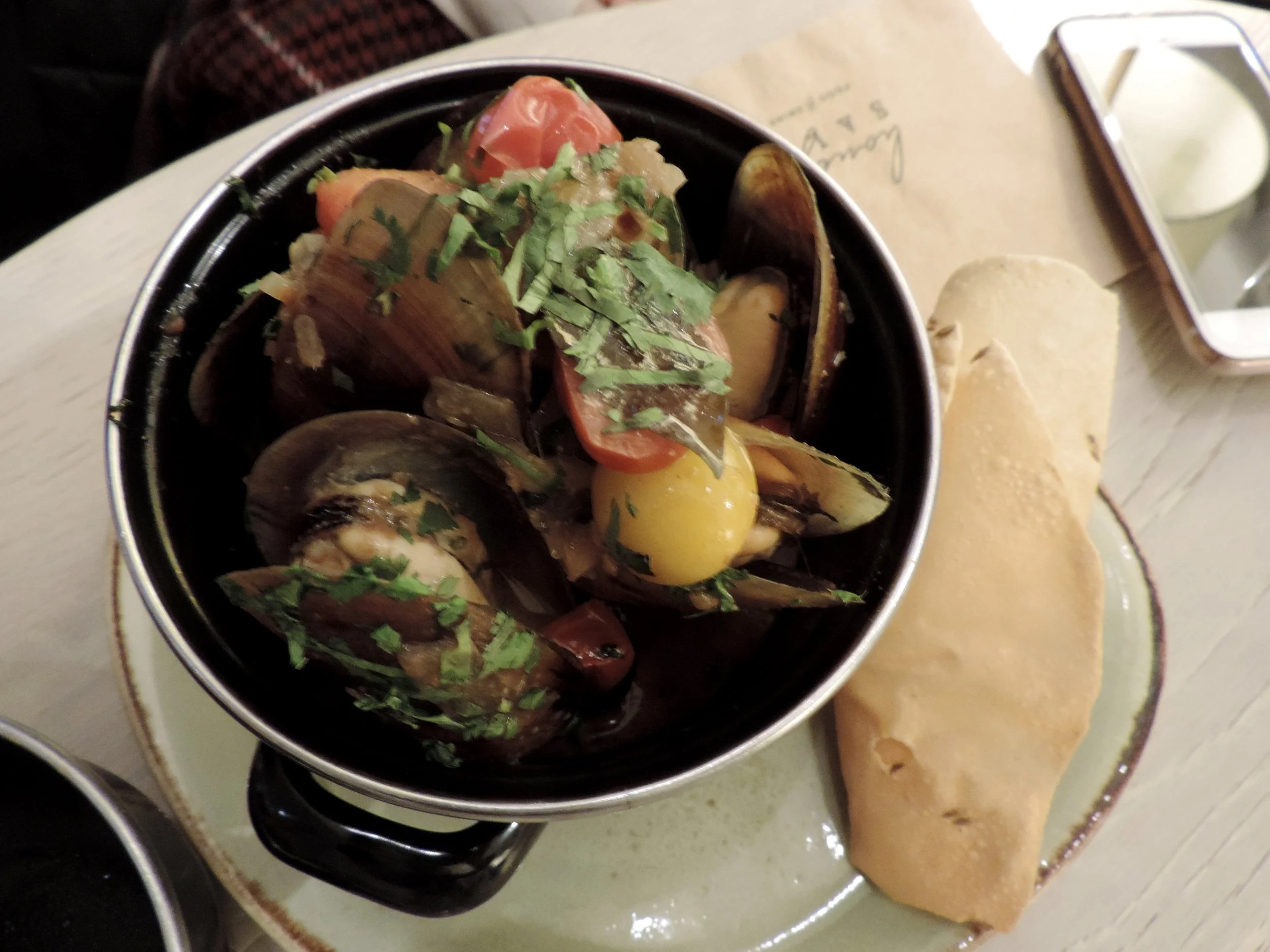 BC Honey Mussels - malabar curry broth, tamarind coconut, cilantro