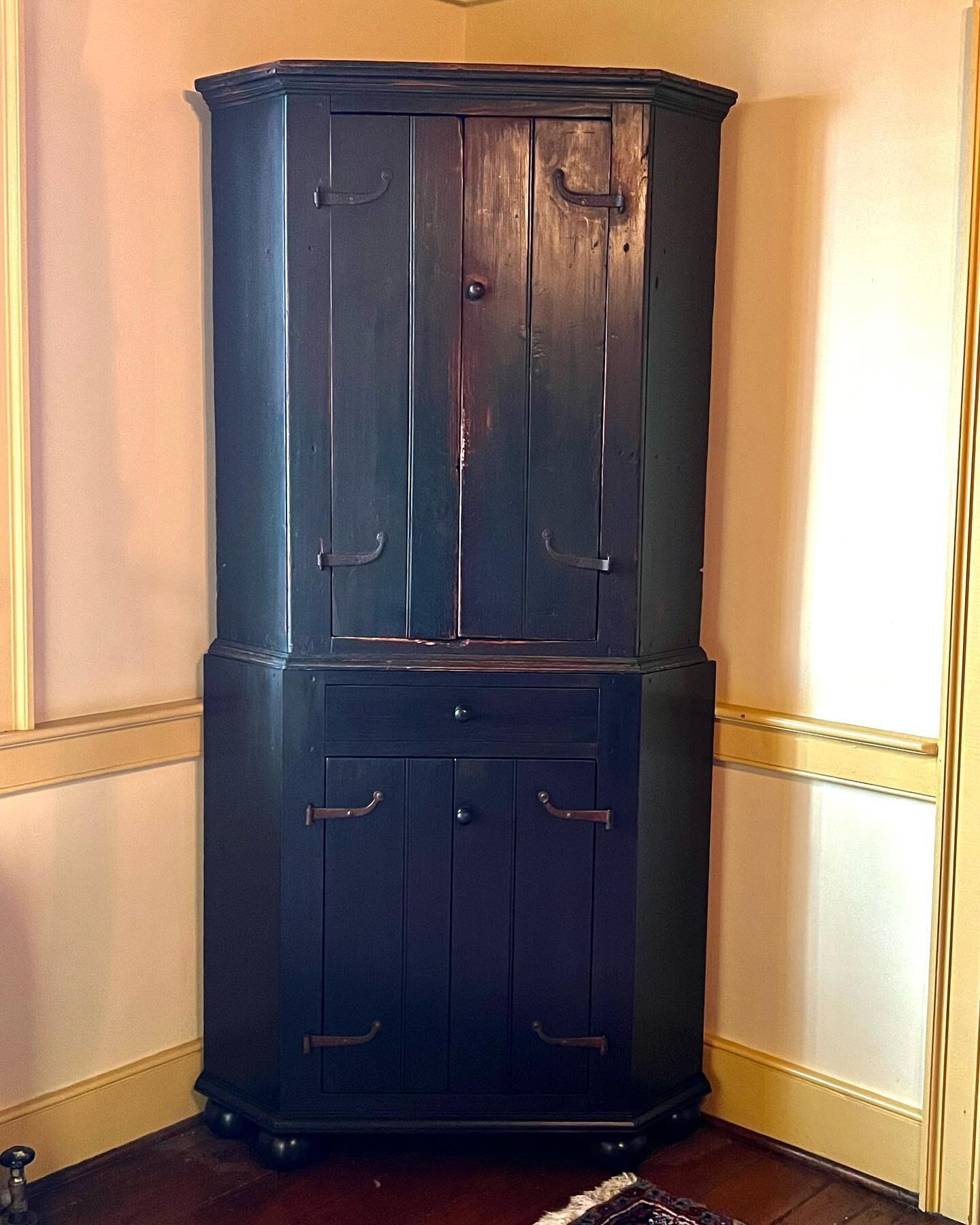 My customer came to me with the upper half of this very old corner cupboard and some ideas of what the lower half should/would have looked like. I added the drawer to the design, and we had the hinges custom made by Tim Coldren in PA. I did all of th
