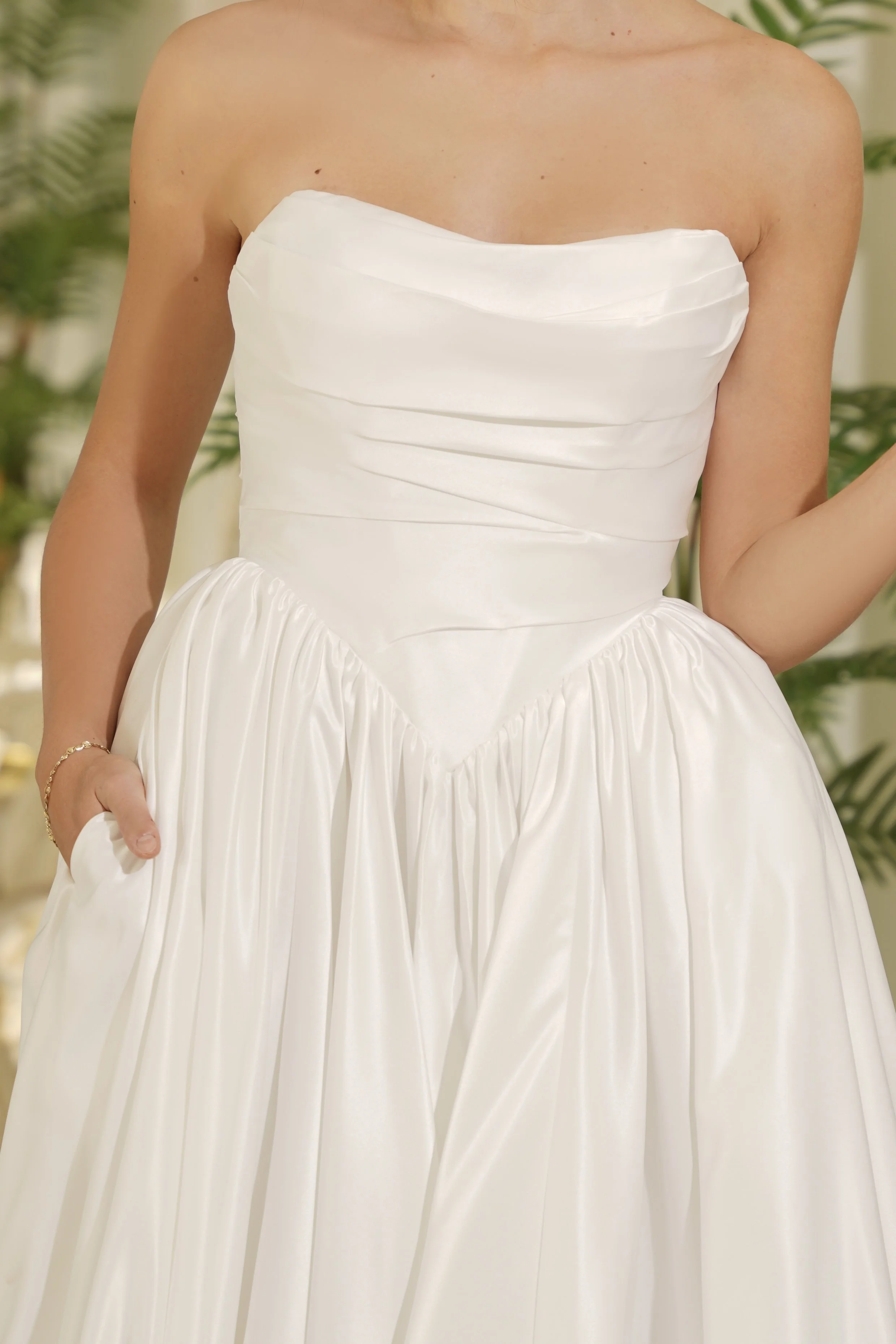 Ruched bust, v front bridal gown made from sumptuous bridal satin