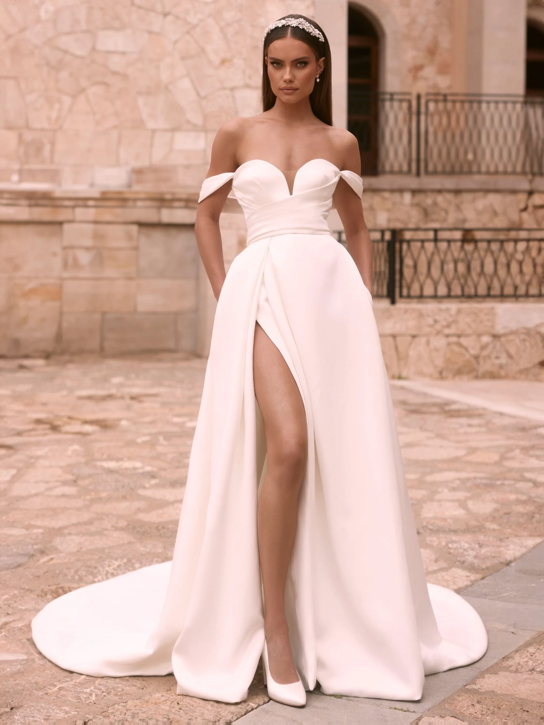 agrias-.jpg sastin bridal gown with under bust draping and arms showing arm drape