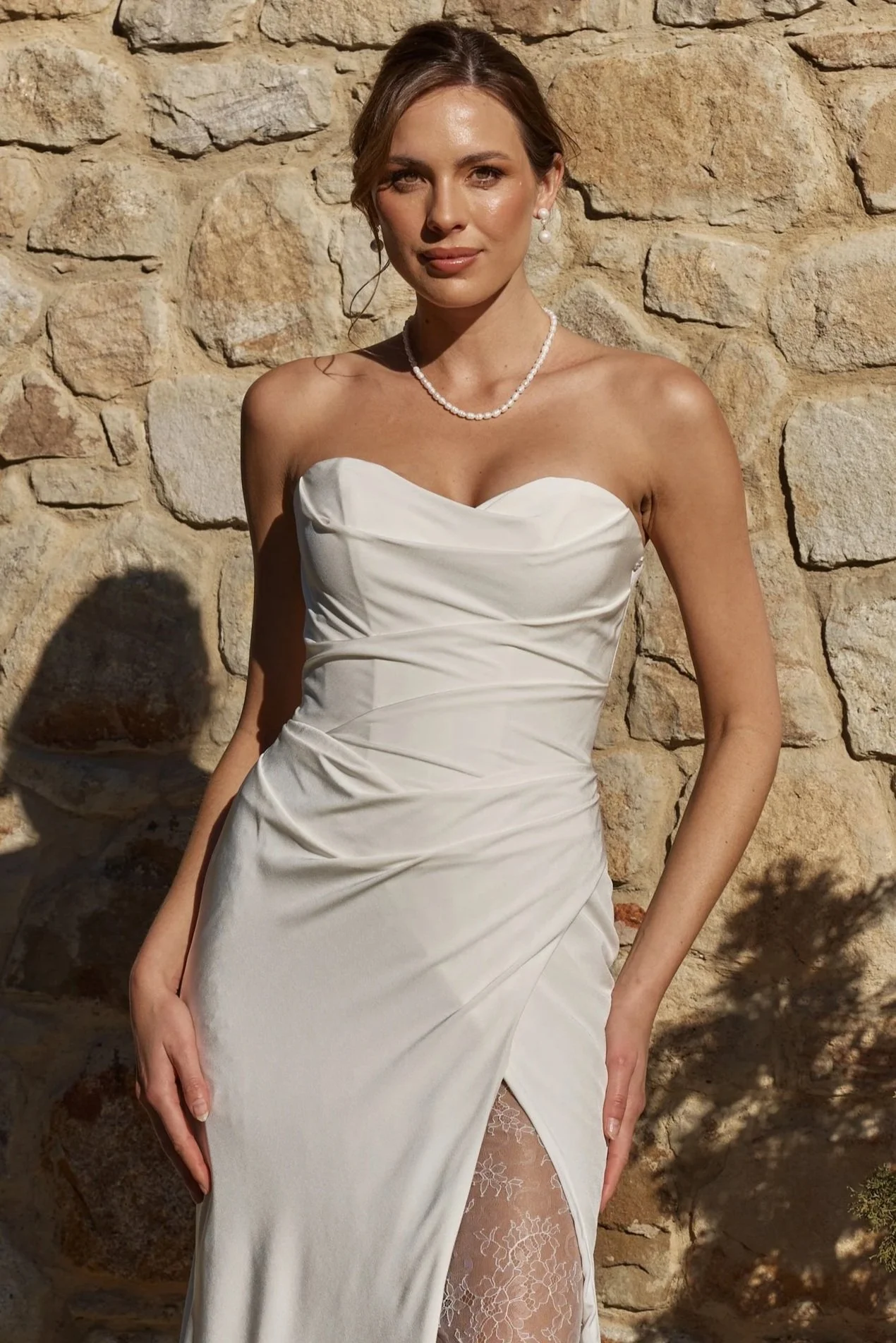 Edelweiss strapless crepe wedding dress with slit and chapel train