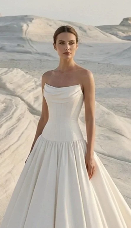 Striking lux bridal gown in modern mikado with longline bodice. shot in a minimalsist barron setting