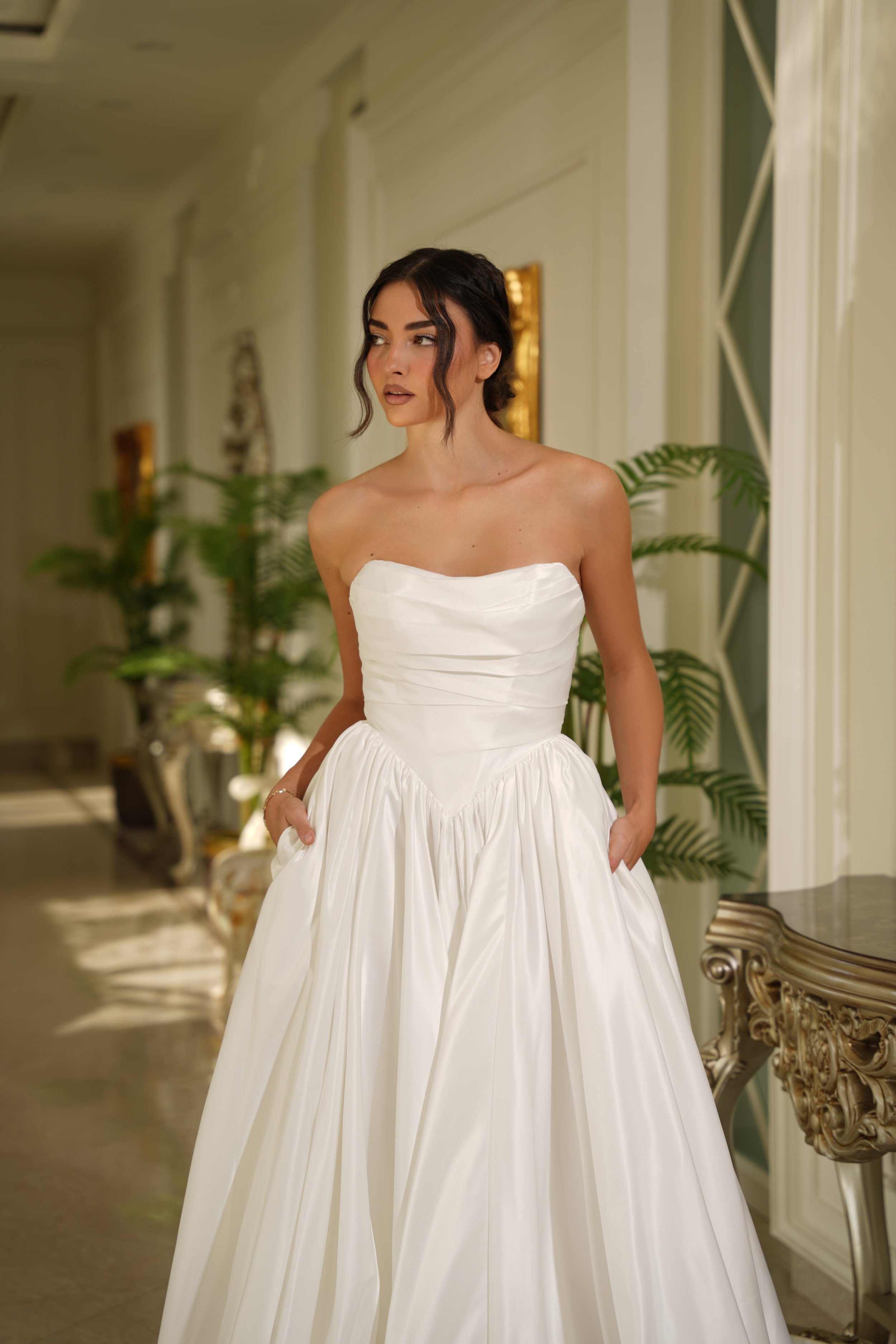 Ruched bust, v front bridal gown made from sumptuous bridal satin