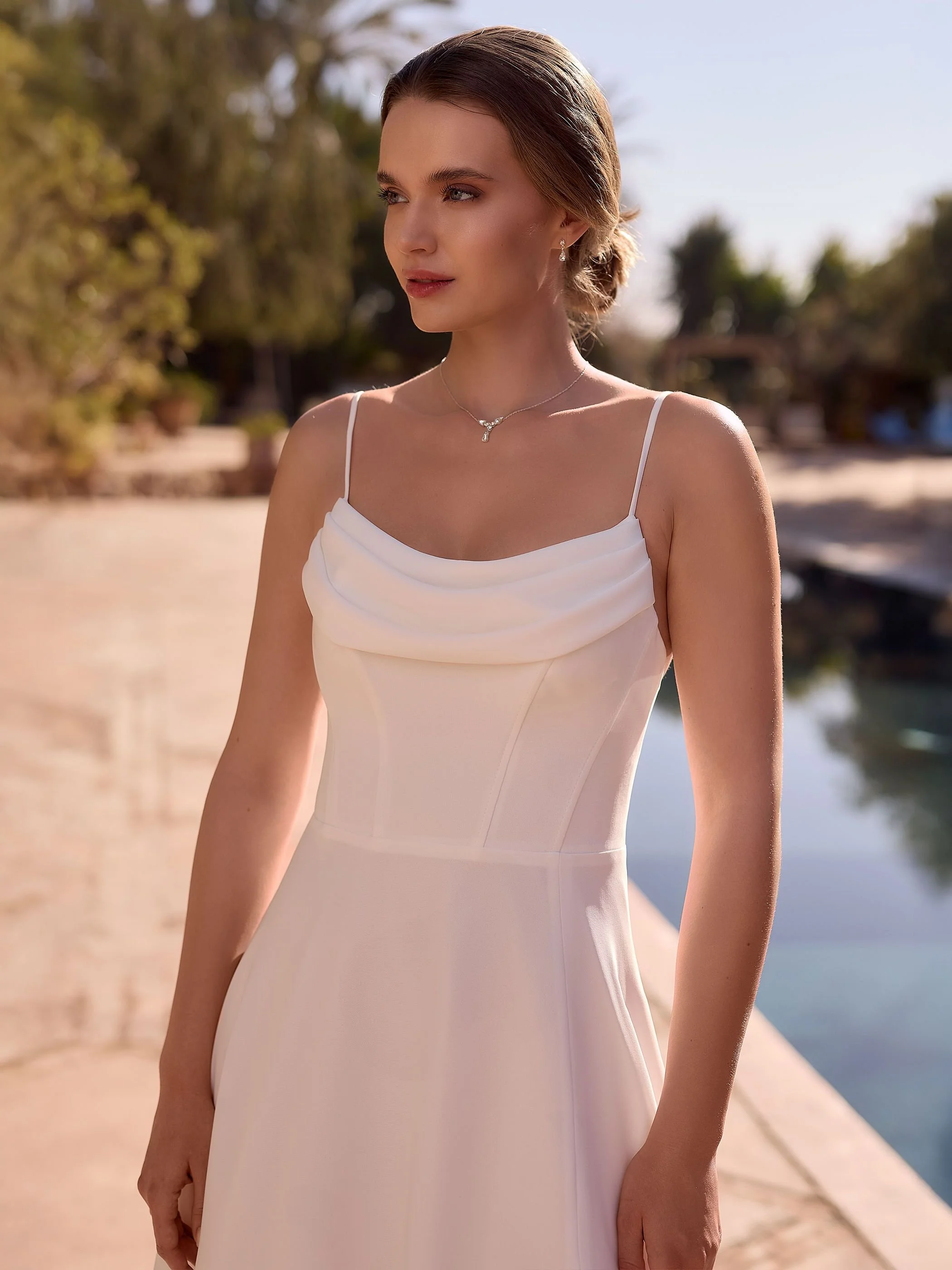 faux wool crepe, this A-line gown drapes beautifully from a natural waistline