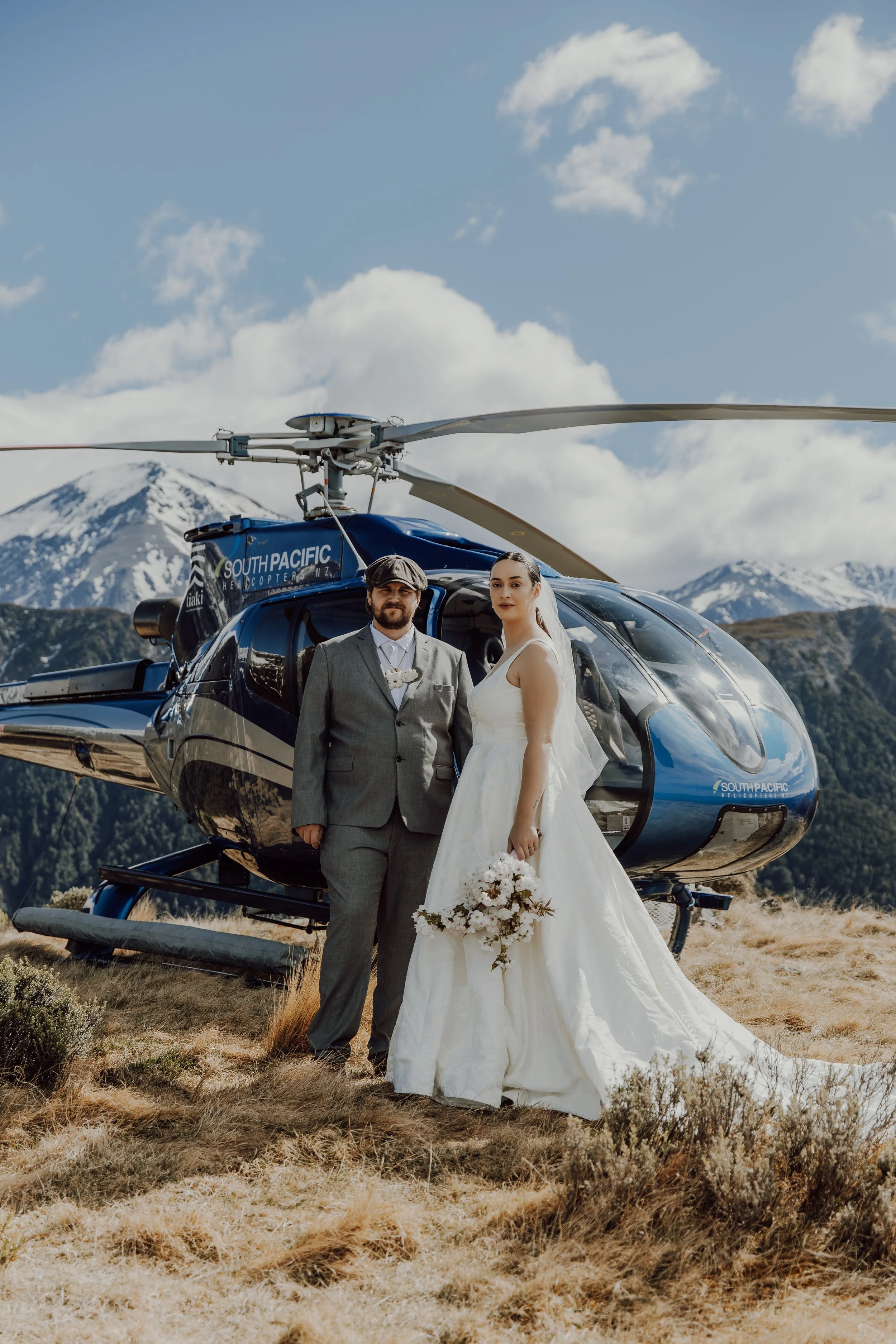 Rainer and lauchie mountaintop closeup heli.jpeg