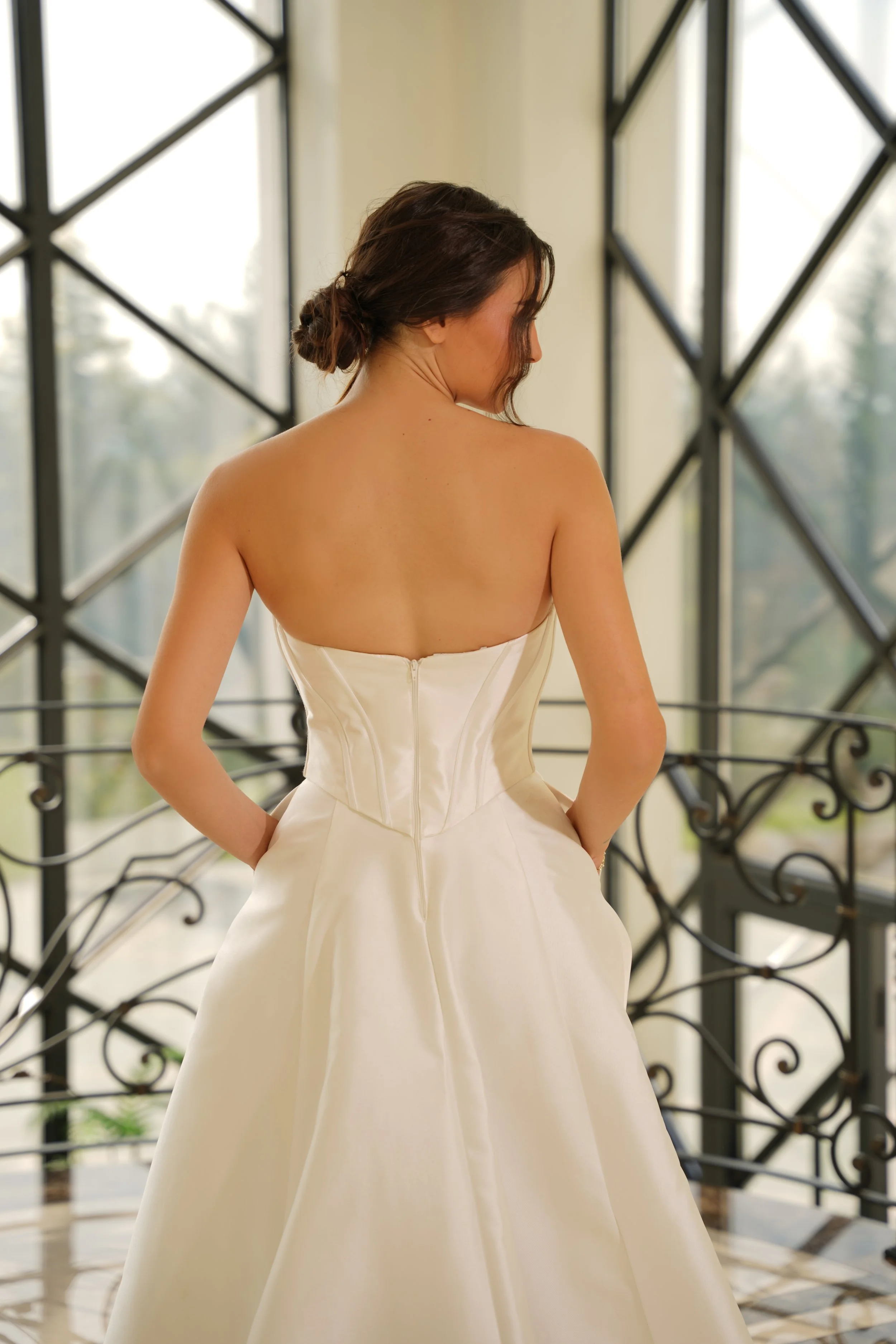 Mikado bridal gown closeup of back with boning detail and twist feature