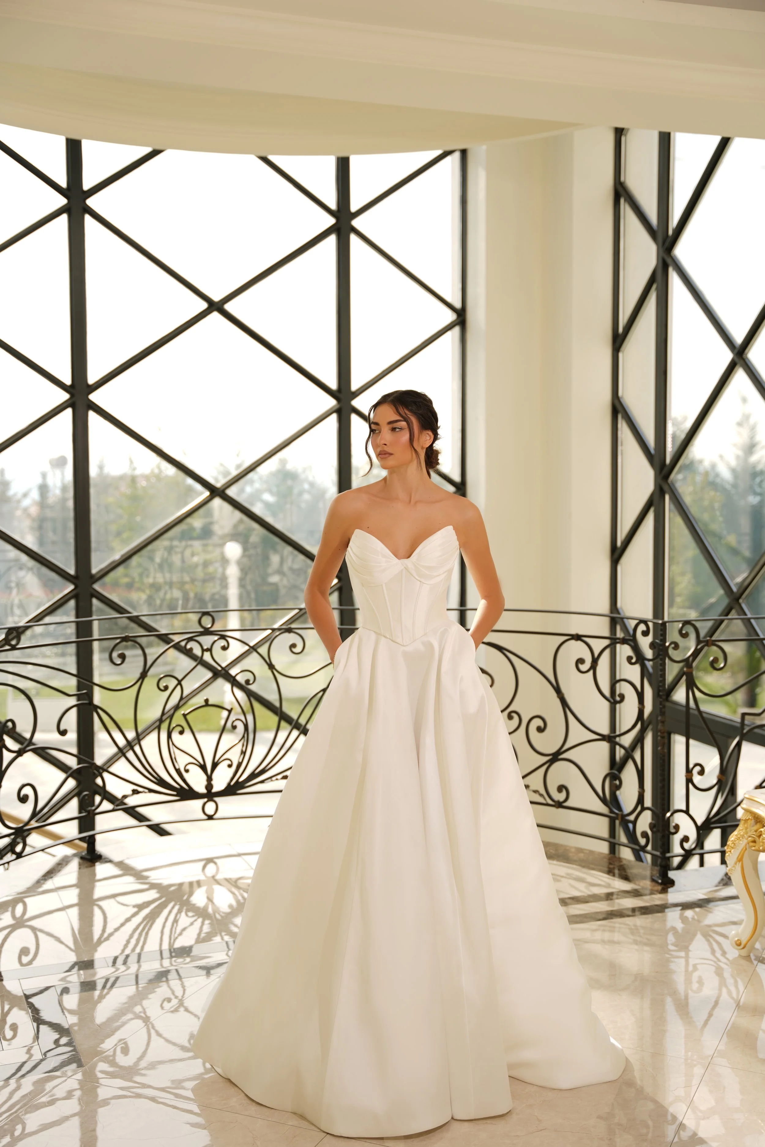 Mikado bridal gown closeup of bust with boning detail and twist feature