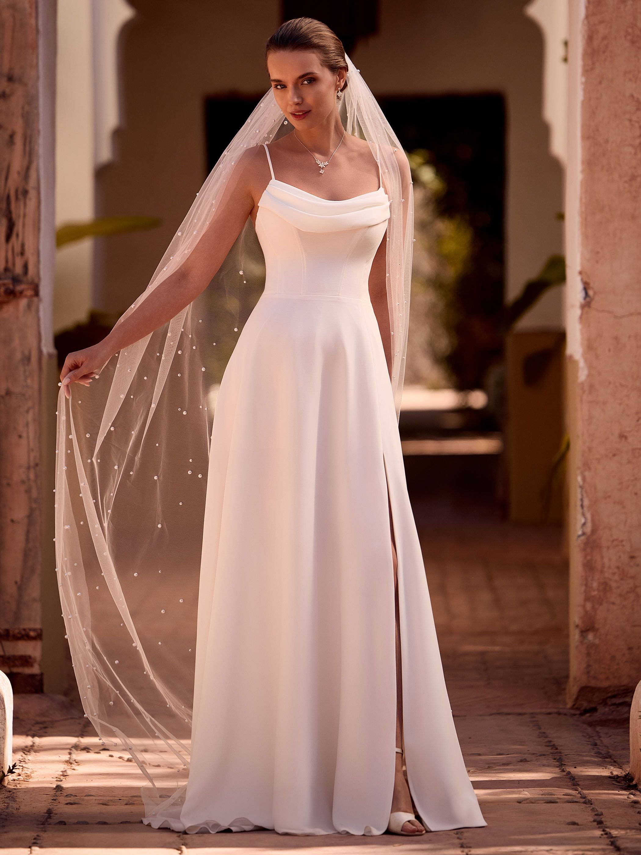 faux wool crepe, this A-line gown drapes beautifully from a natural waistline
