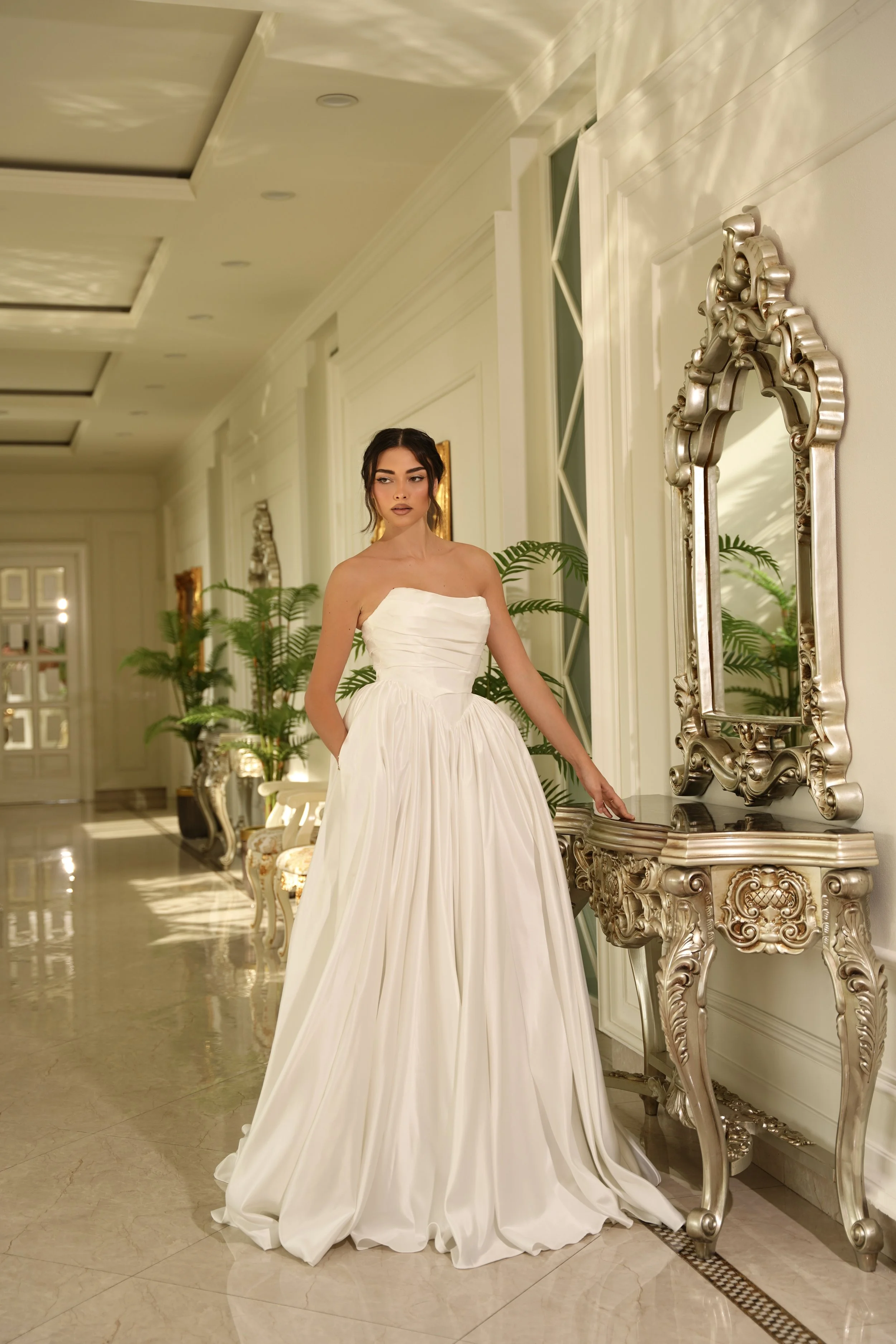 Ruched bust, v front bridal gown made from sumptuous bridal satin